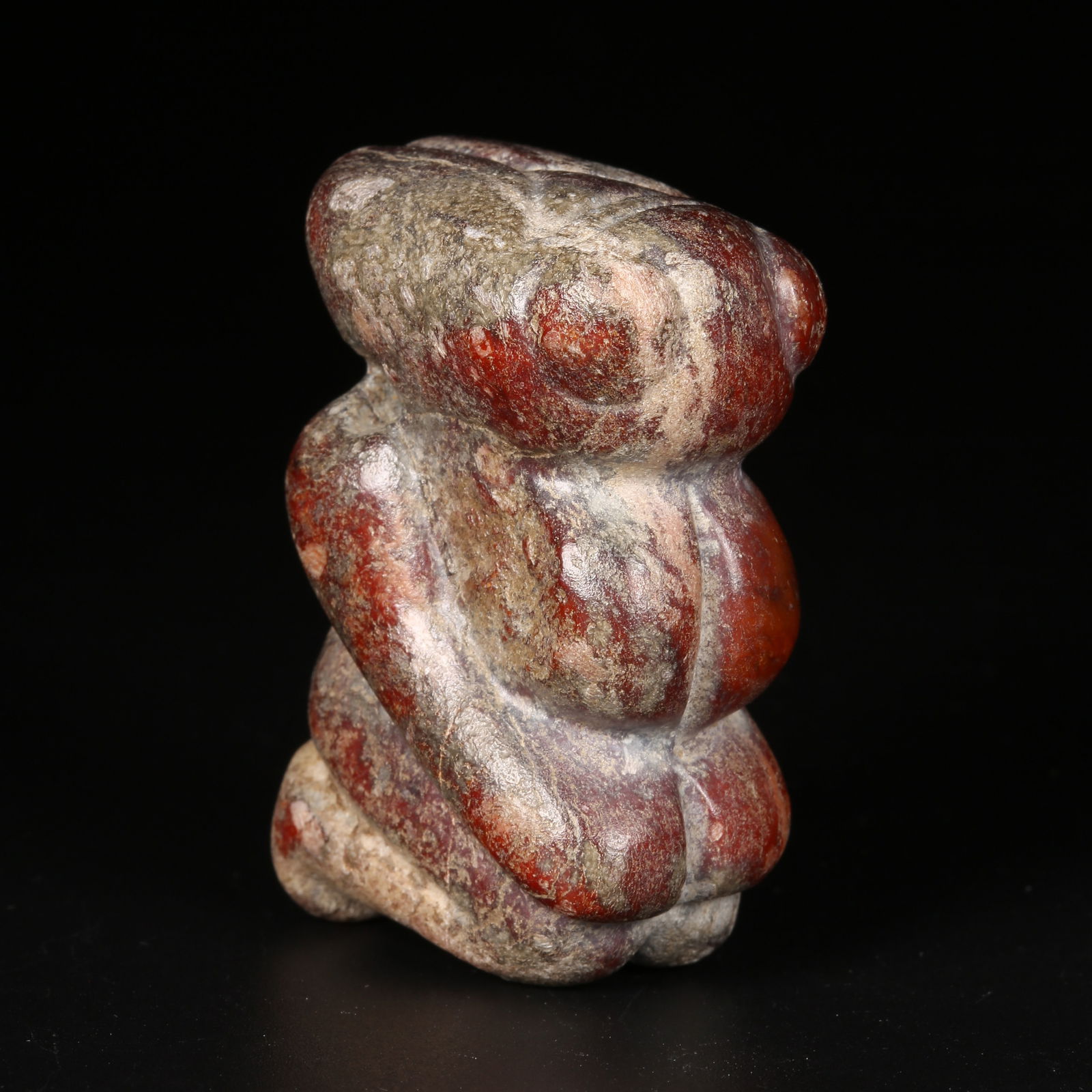 A ARCHAIC JADE DEITY FIGURE PENDANT (1 of 8)
