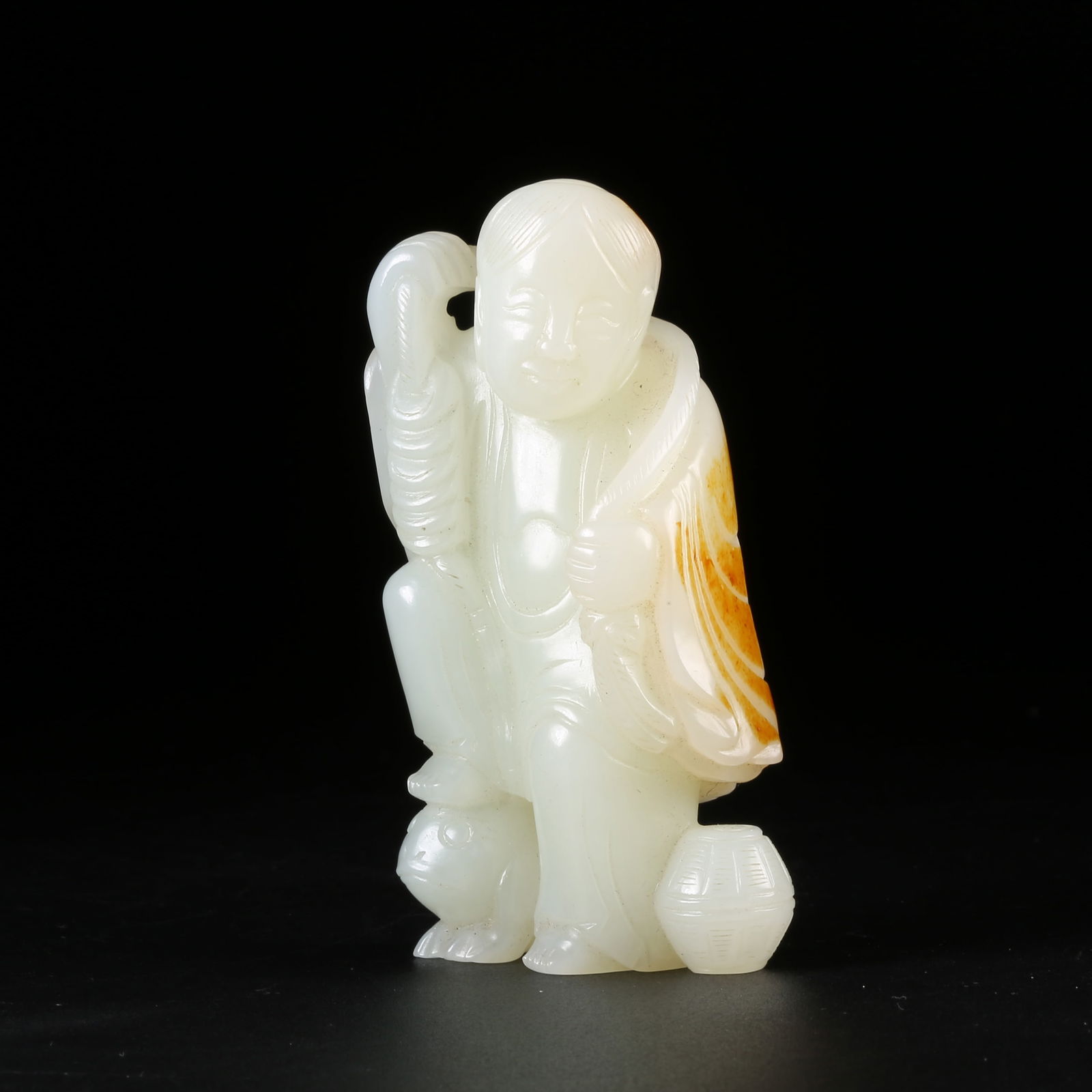 A HETIAN JADE LIU HAI PLAYING WITH THE GOLDEN TOAD ORNAMENT: Hetian Jade Liu Hai Playing with the Golden Toad Ornament