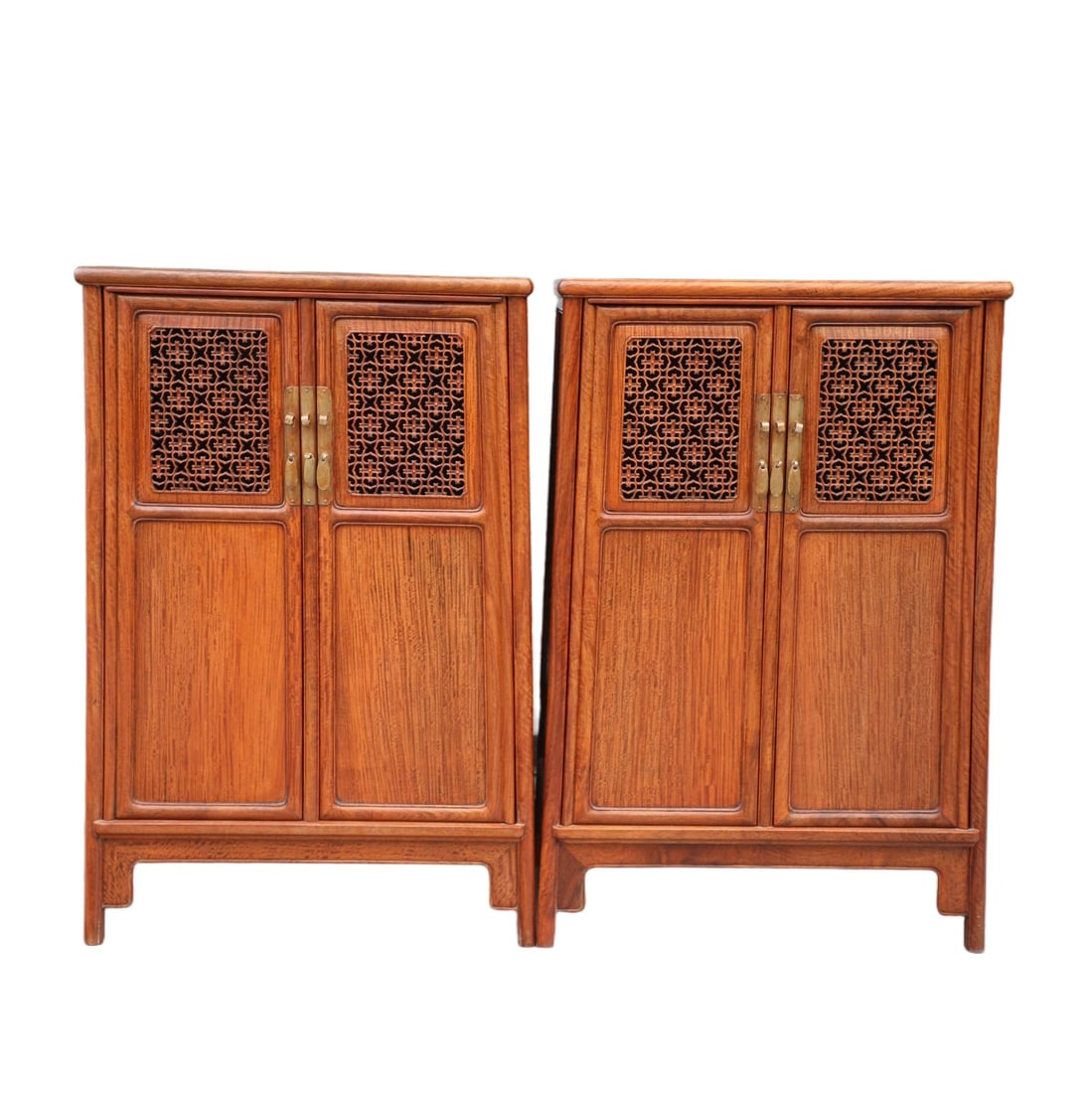 A PAIR OF HUANGHUALI CORNER CABINETS CARVED WITH LINGZHI MOTIFS: Pair of Huanghuali corner cabinets carved with lingzhi motifs
