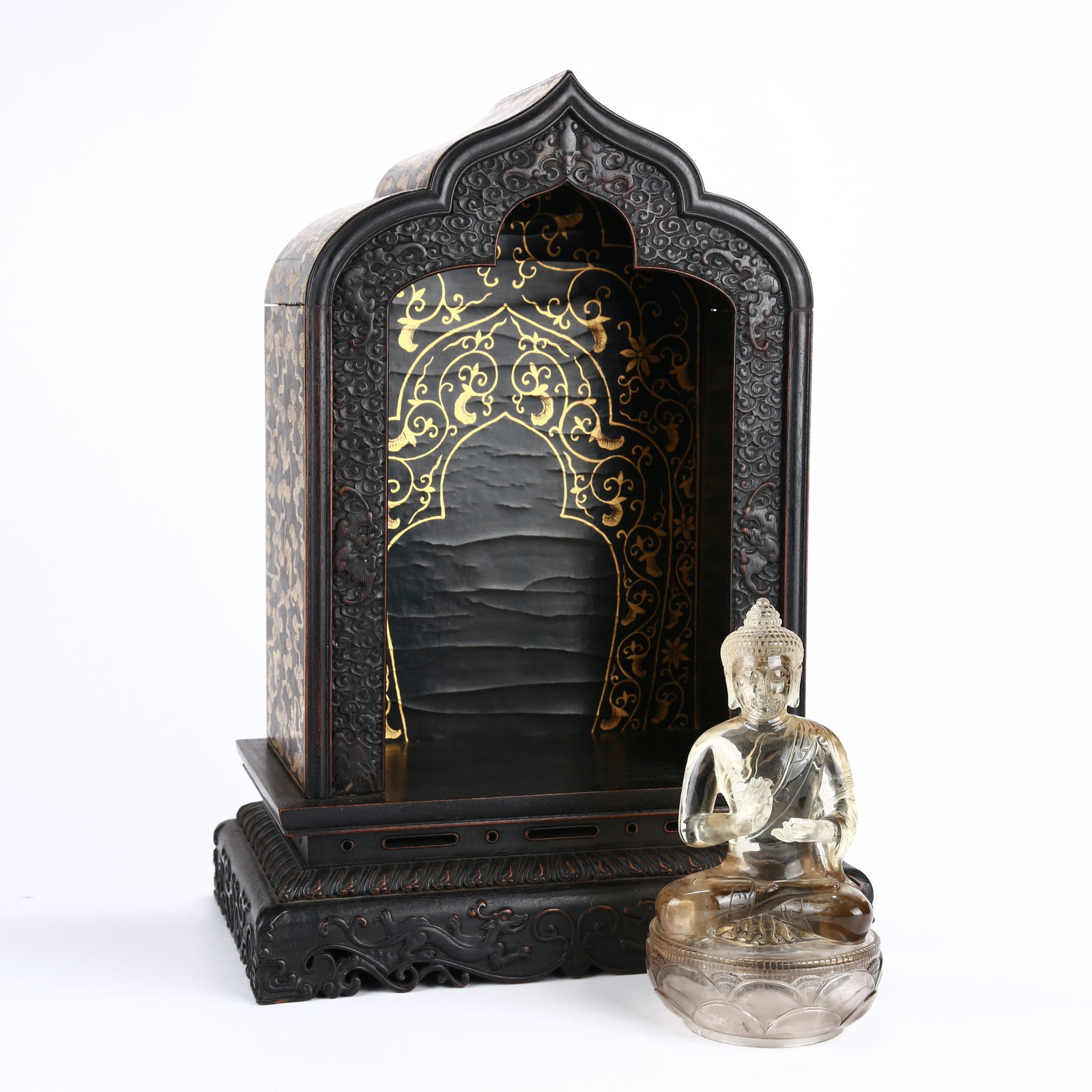 A CRYSTAL LAMP-LIGHTING BUDDHA WITH ZITAN SHRINE: Crystal lamp-lighting Buddha with zitan shrine