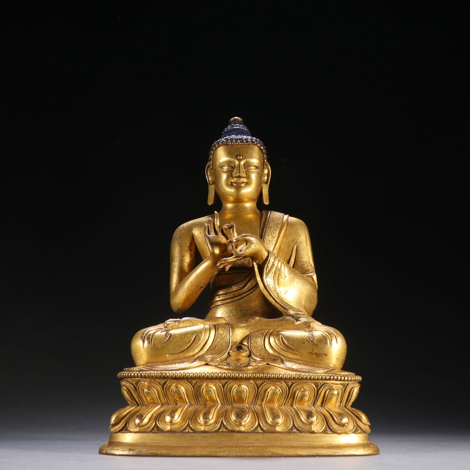 A GILDED BRONZE SHAKYAMUNI BUDDHA: Gilded Bronze Shakyamuni Buddha