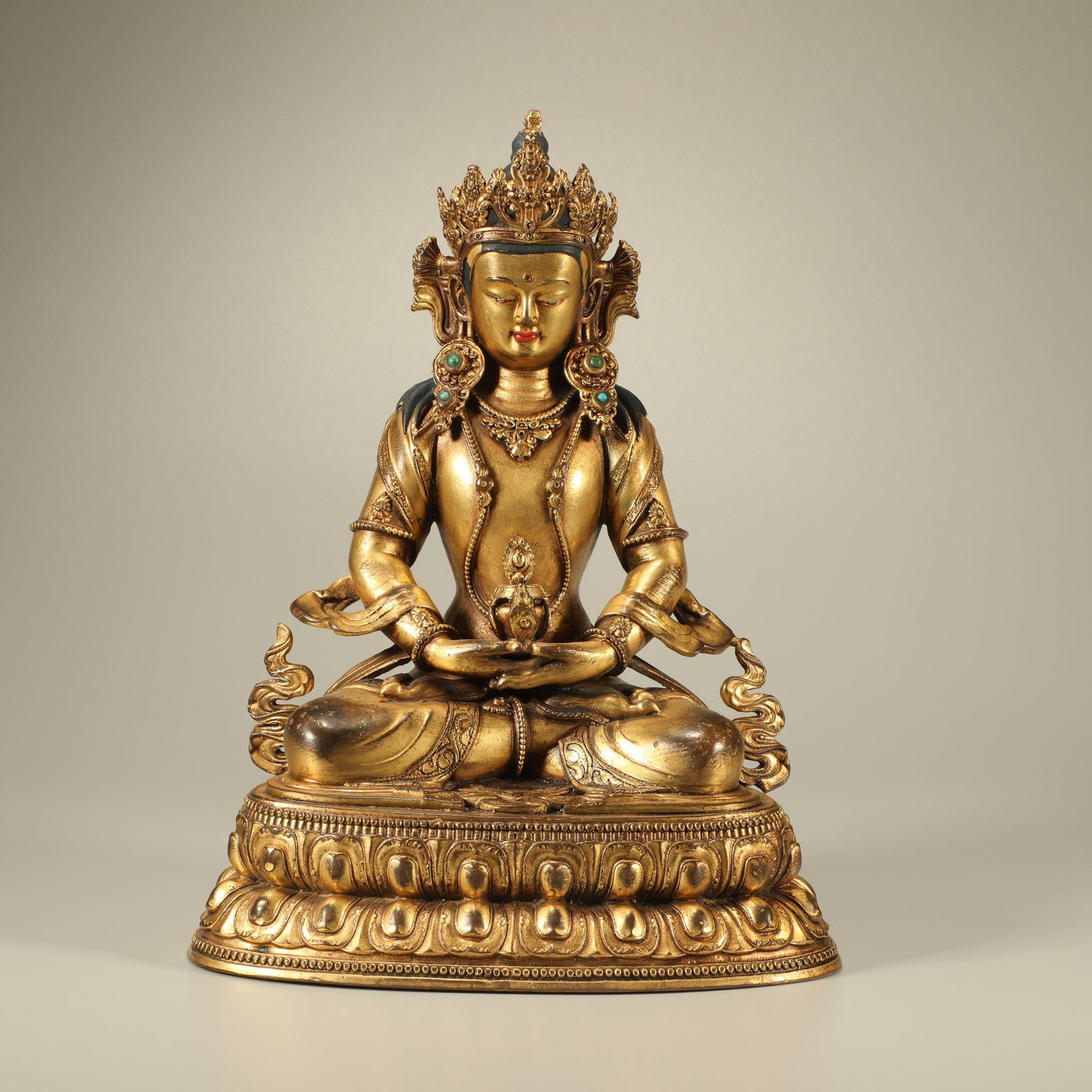 A GILT BRONZE LONGEVITY BUDDHA STATUE: Gilt bronze Longevity Buddha statue