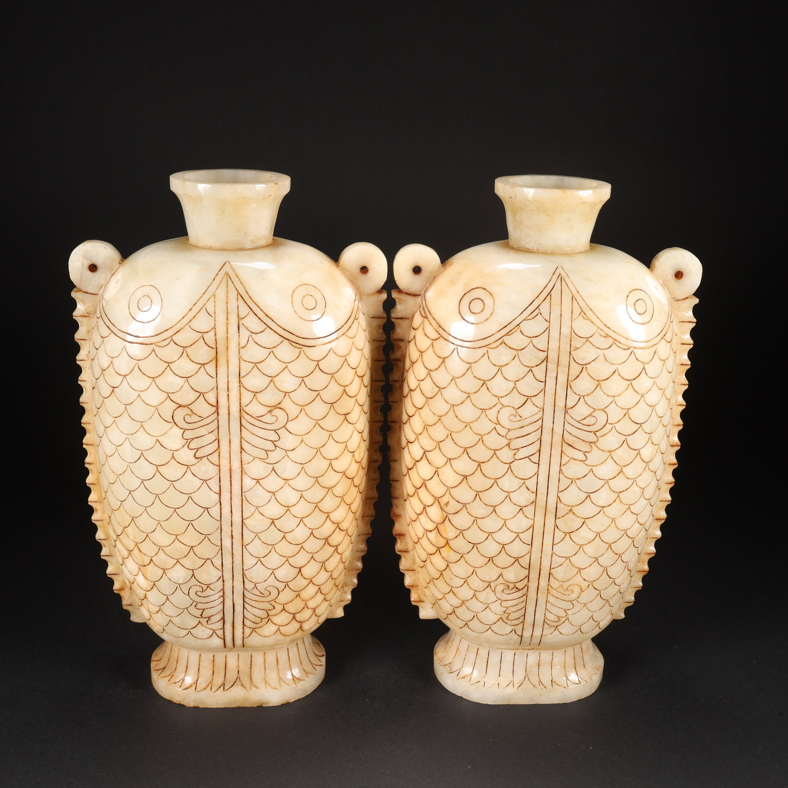 A PAIR OF HETIAN JADE FISH VASES WITH SCALE PATTERNS (1 of 9)