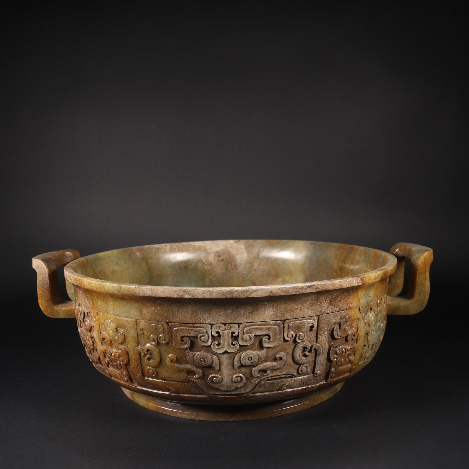 A HETIAN JADE DOUBLE-HANDLED GUI WITH AUSPICIOUS BEAST MOTIFS (1 of 9)