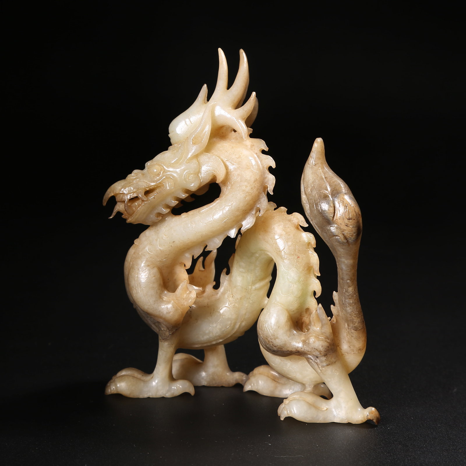 A ANCIENT JADE DIVINE DRAGON ORNAMENT (1 of 8)
