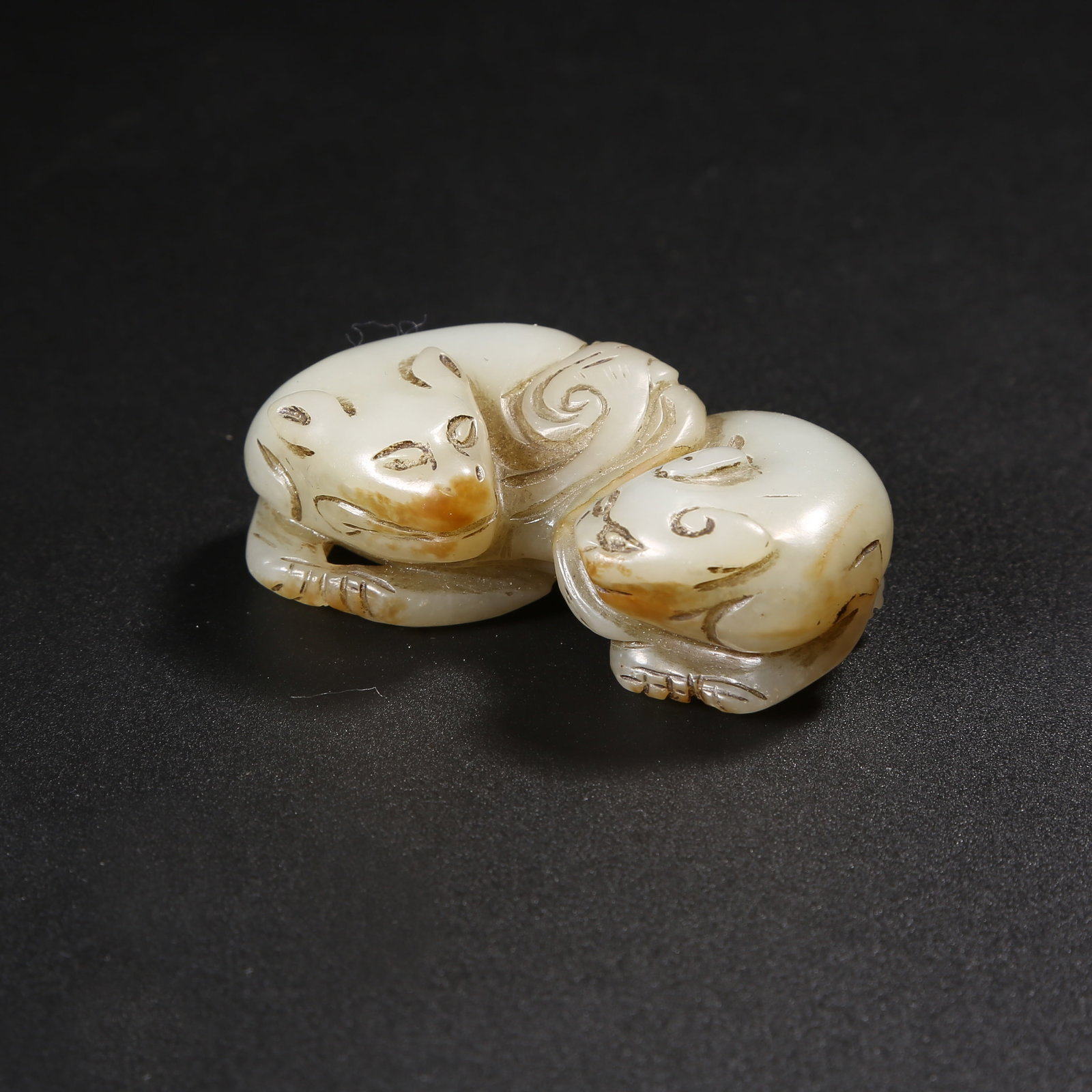 A HETIAN JADE DOUBLE HAPPINESS ORNAMENT (1 of 8)