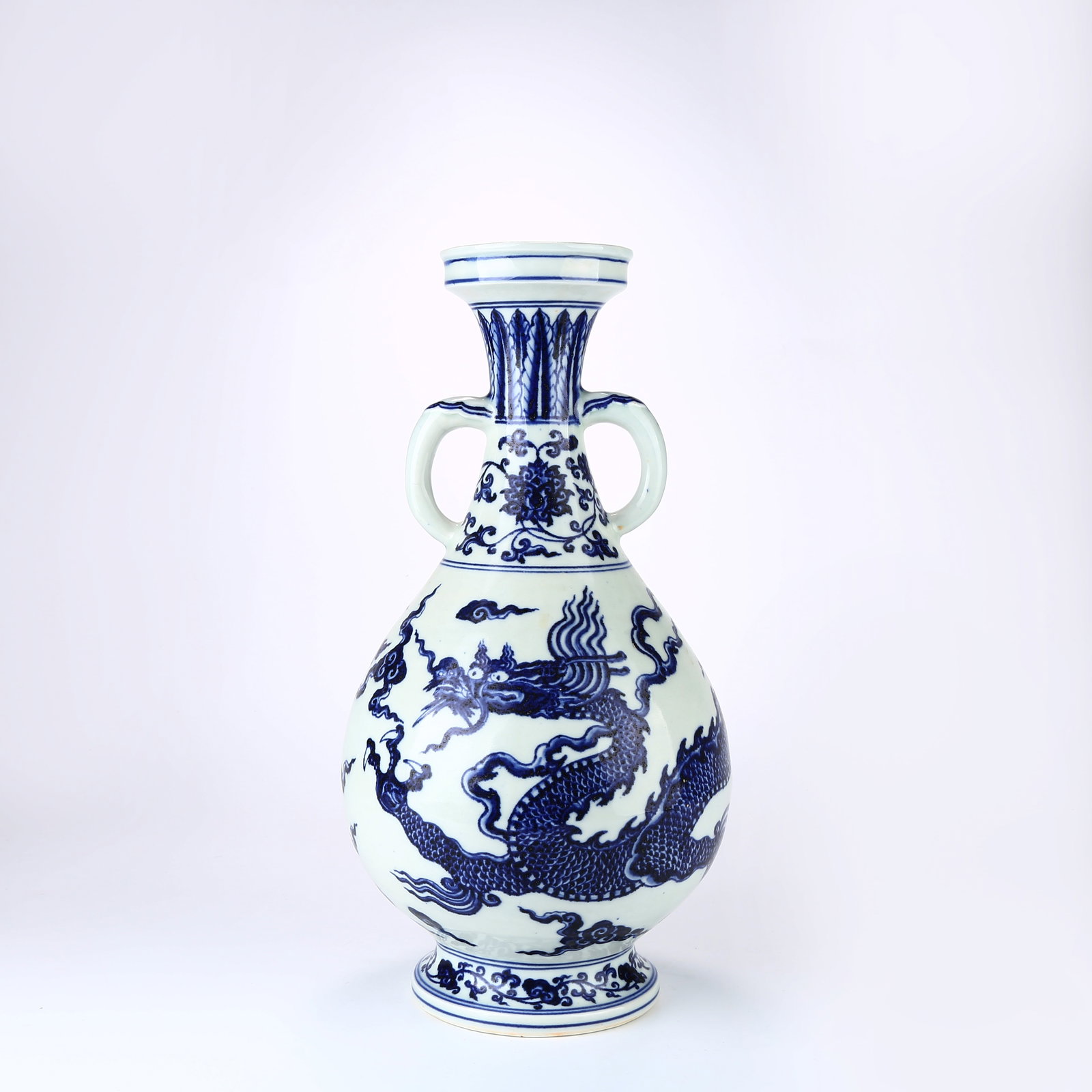 A BLUE AND WHITE VASE WITH CLOUD AND DRAGON PATTERN AND DOUBLE HANDLES (1 of 10)