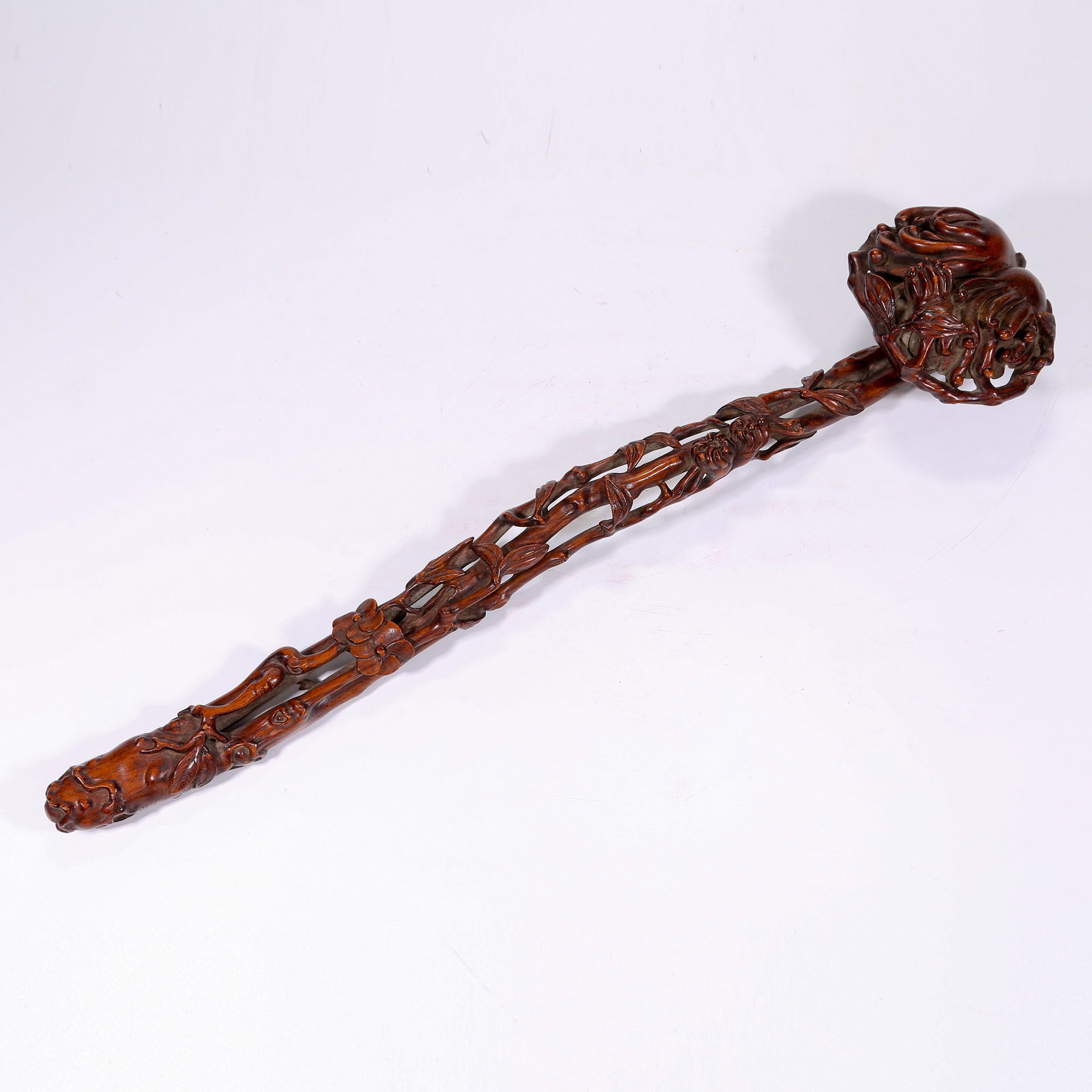 A HUANGHUALI WOOD RUYI SCEPTER WITH BUDDHA‘S HAND PATTERN (1 of 6)