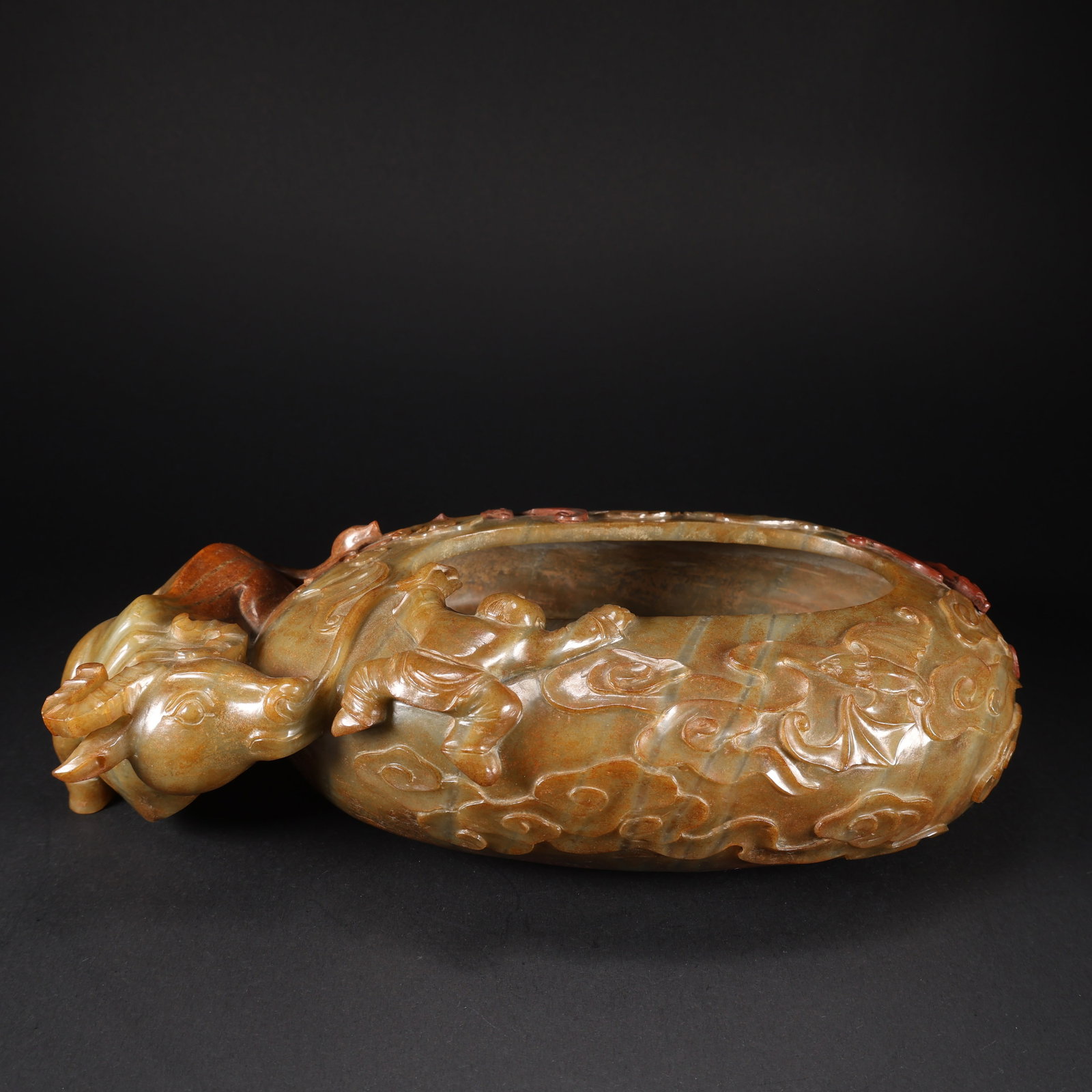 A HETIAN JADE BRUSH WASHER WITH FU BATS, AUSPICIOUS CLOUDS, AND CHILD PLAYING WITH OX (1 of 9)
