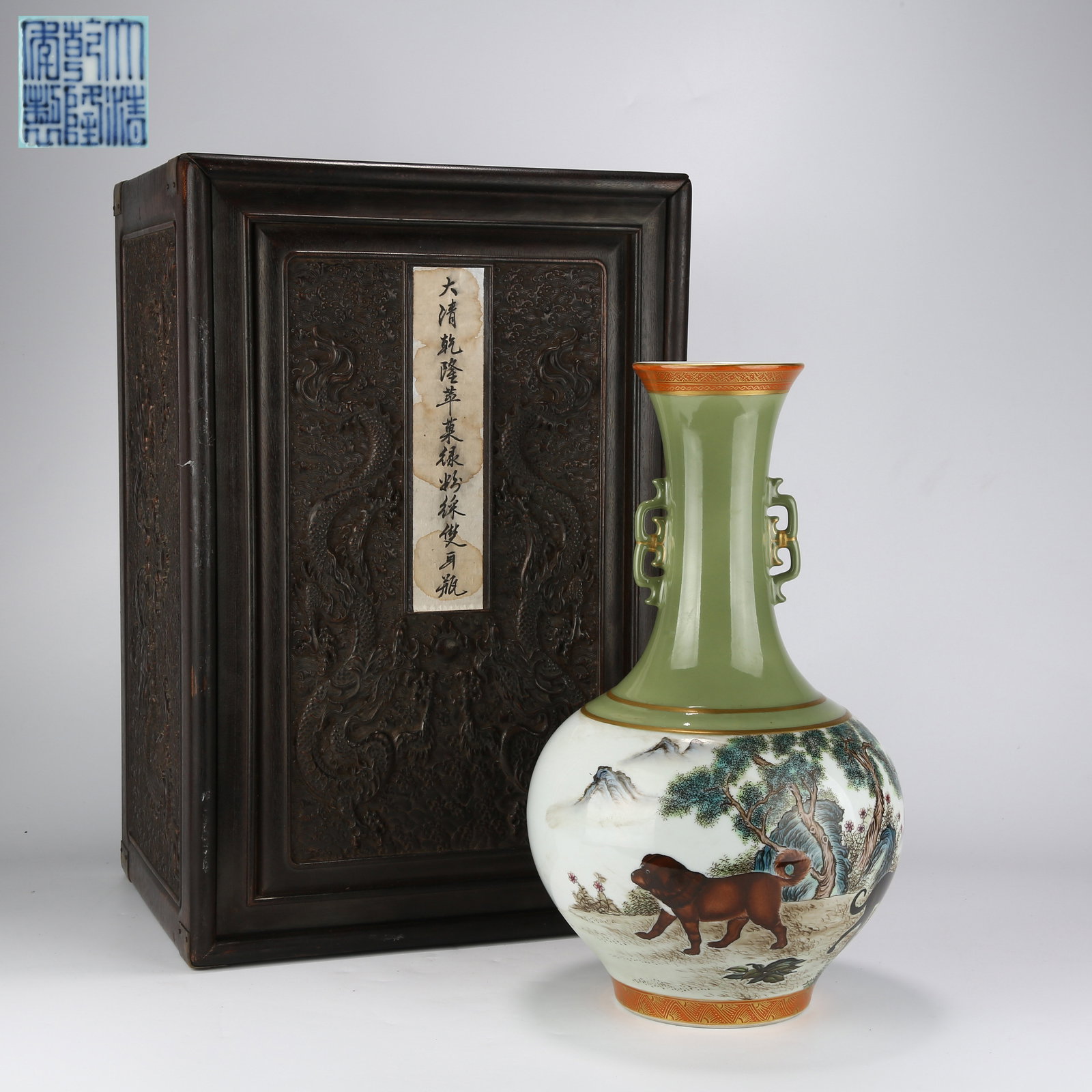 A FAMILLE-ROSE TWIN-HANDLED VASE WITH DOGS MOTIF: Famille-Rose Twin-Handled Vase with Dogs Motif