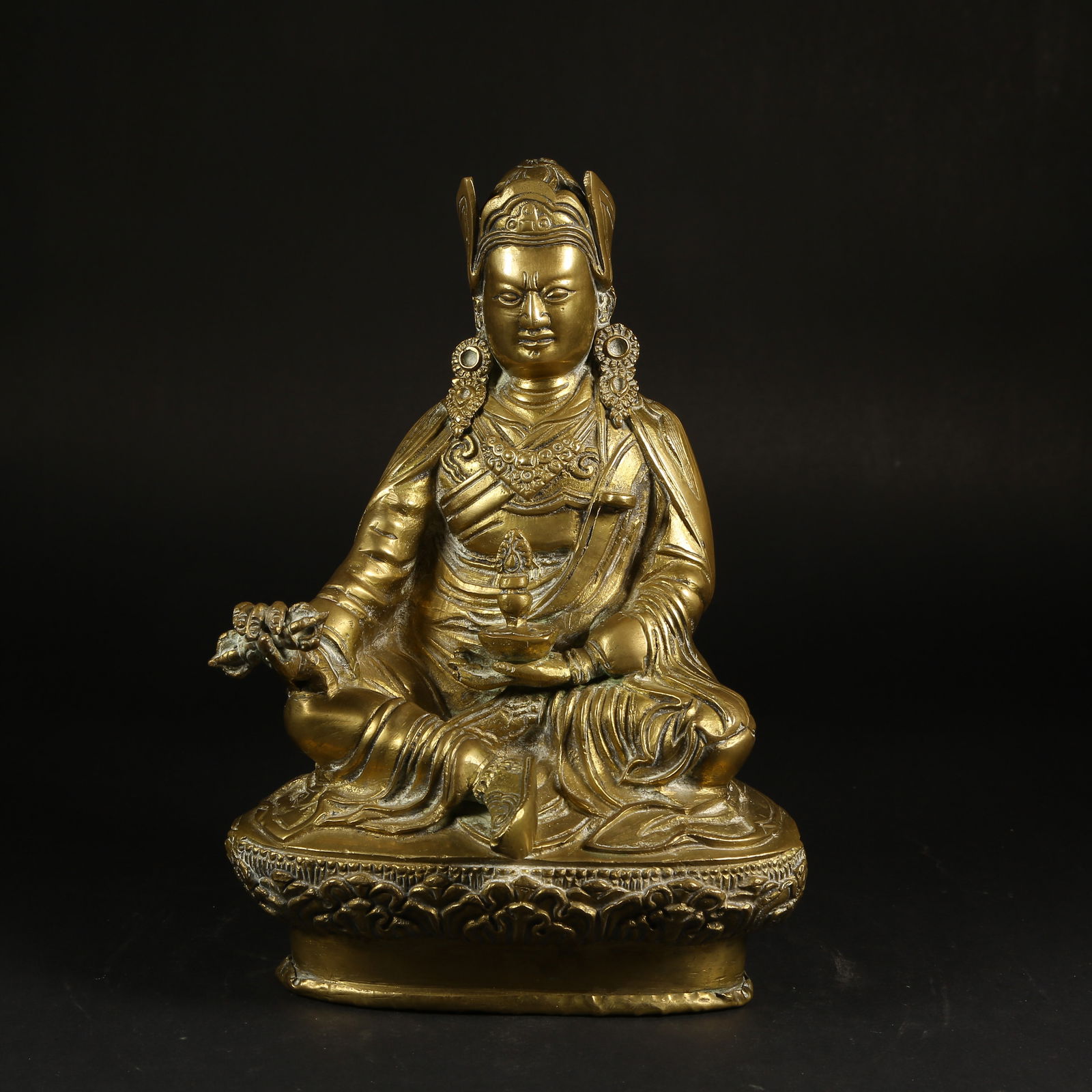 A GILT-BRONZE STATUE OF PADMASAMBHAVA (1 of 9)