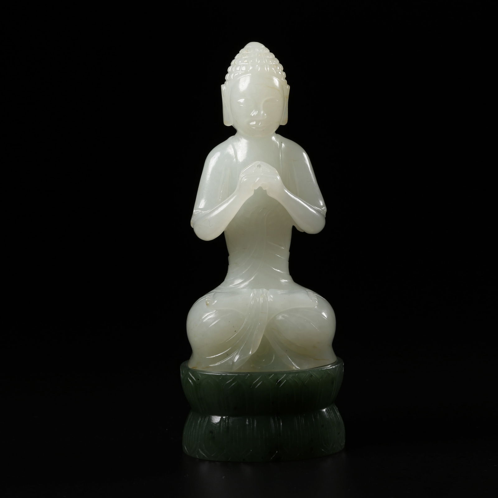 A HETIAN WHITE JADE SEATED VAIROCANA BUDDHA: Hetian white jade seated Vairocana Buddha