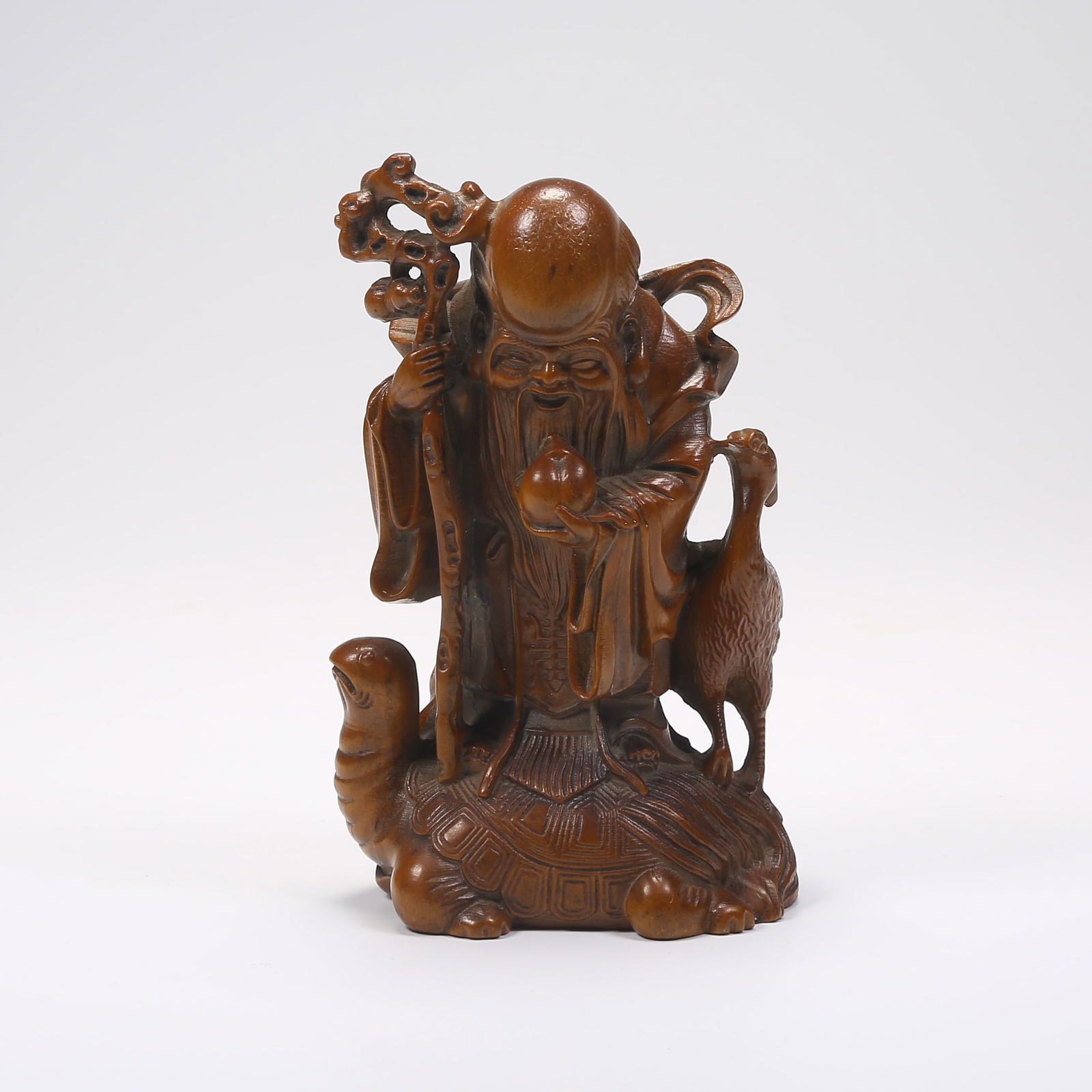 A BOXWOOD GOD OF LONGEVITY ORNAMENT (1 of 8)