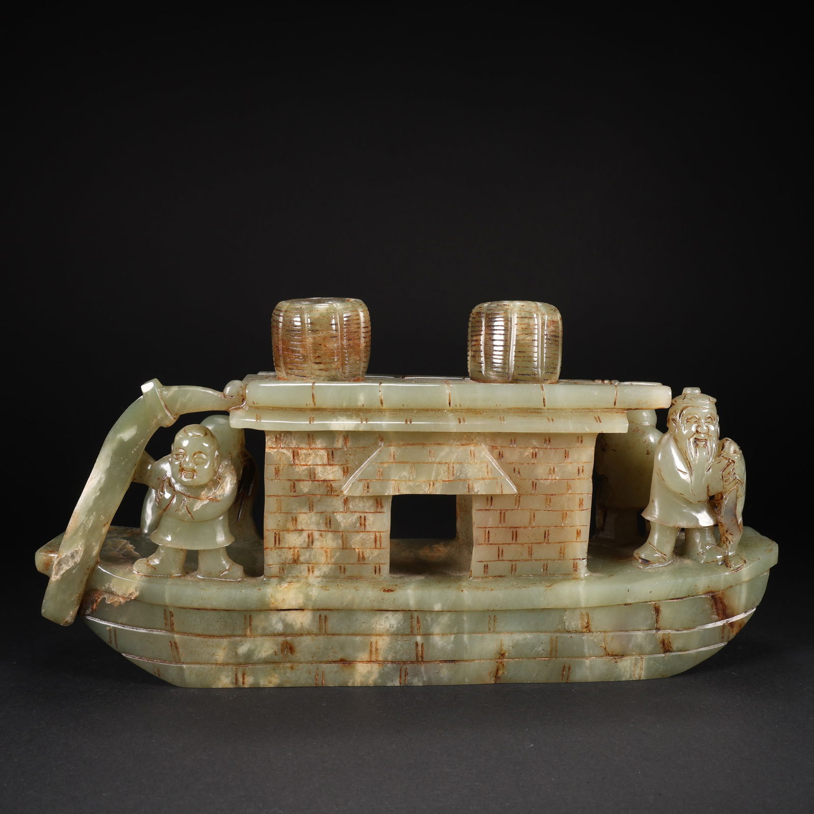 A HETIAN JADE CHILD ON FISHING BOAT: Hetian Jade Child on Fishing Boat