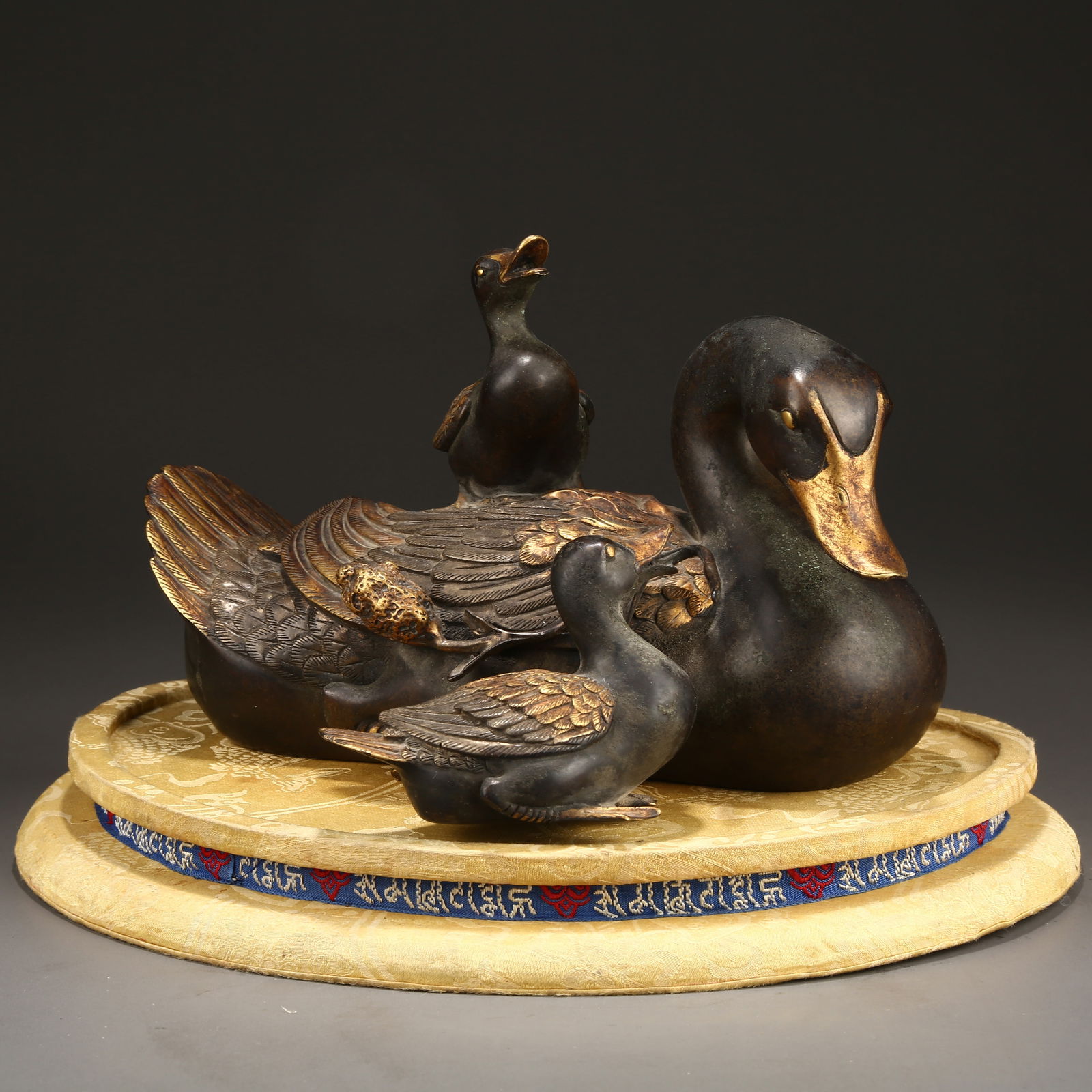 A PARTIALLY GILT BRONZE "TREASURE DUCK" ORNAMENT (1 of 10)