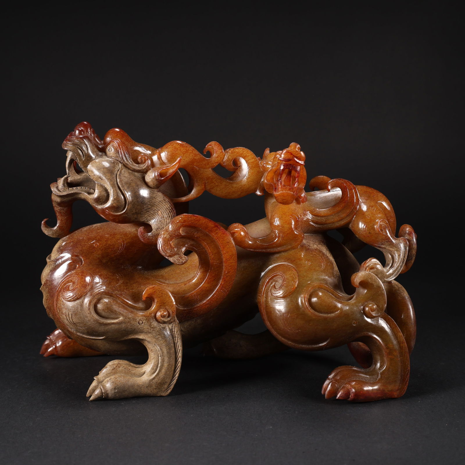 A HETIAN JADE MOTHER-AND-CHILD AUSPICIOUS BEASTS: Hetian Jade Mother-and-Child Auspicious Beasts