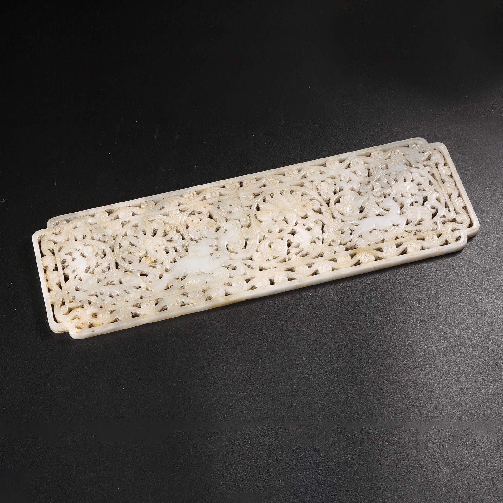 A HETIAN JADE PLAQUE WITH INTERTWINED FLOWER AND AUSPICIOUS BEAST DESIGN (1 of 9)