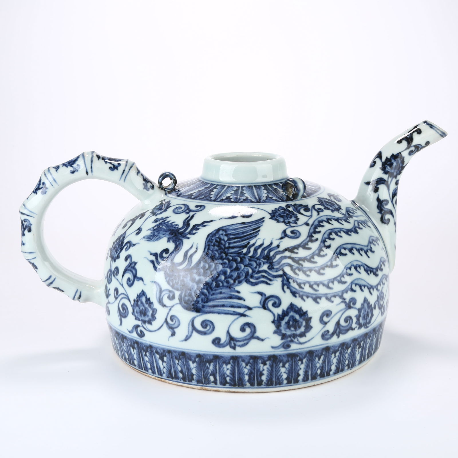A BLUE AND WHITE LARGE EWER WITH PHOENIX AMID FLOWERS MOTIF (1 of 10)