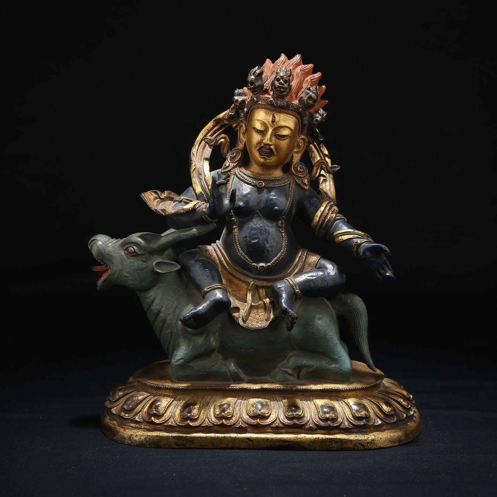 A GILT BRONZE PAINTED DHARMA PROTECTOR STATUE (1 of 9)