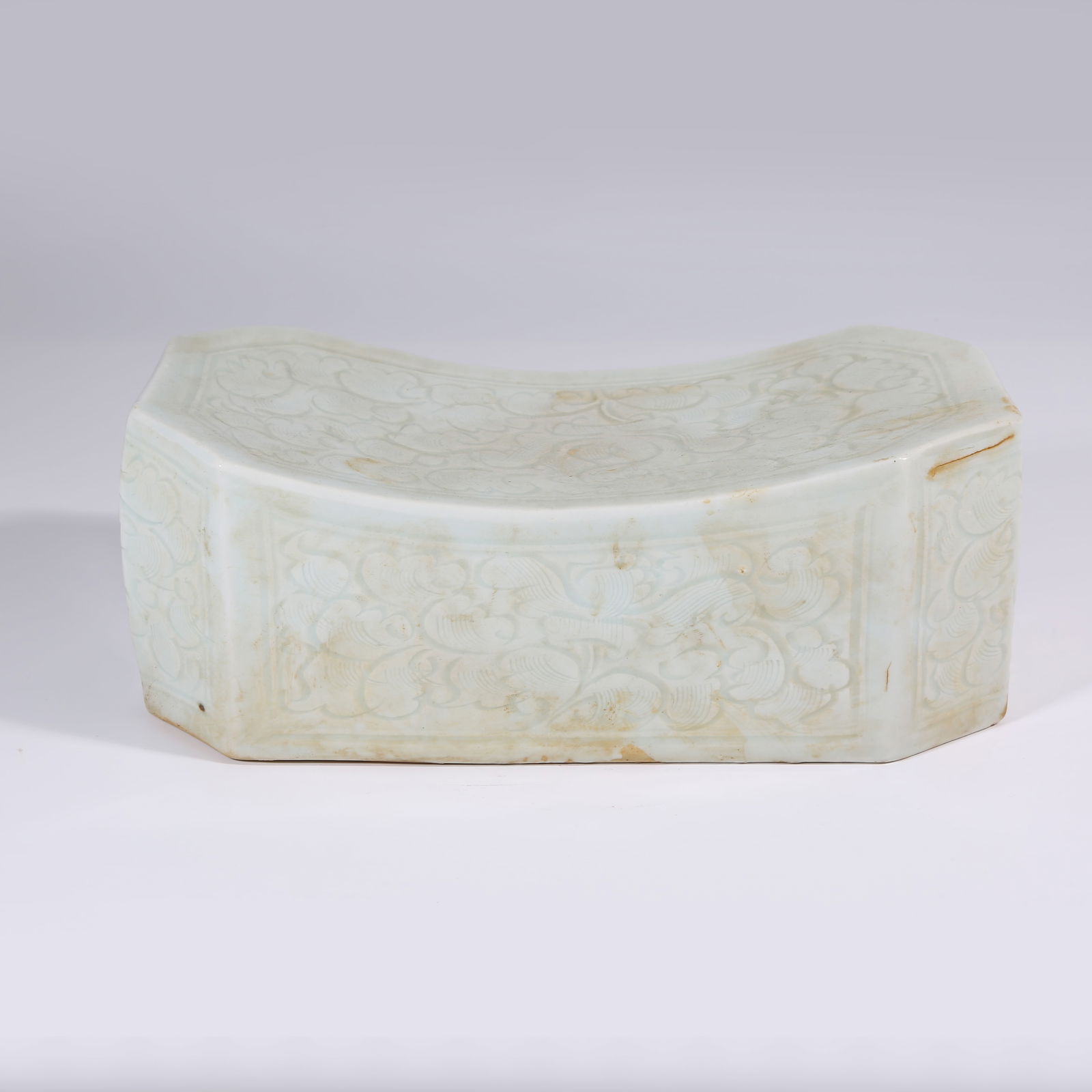 A YINGQING GLAZED PILLOW WITH FLORAL MOTIF (1 of 10)