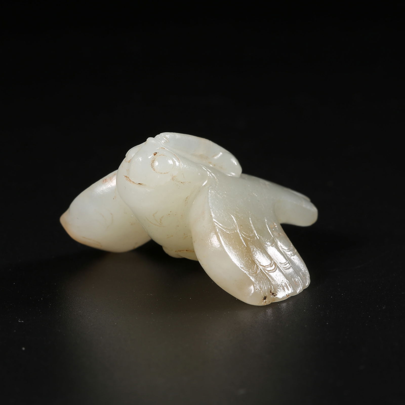 A ANTIQUE JADE OWL PENDANT: Antique jade owl pendant