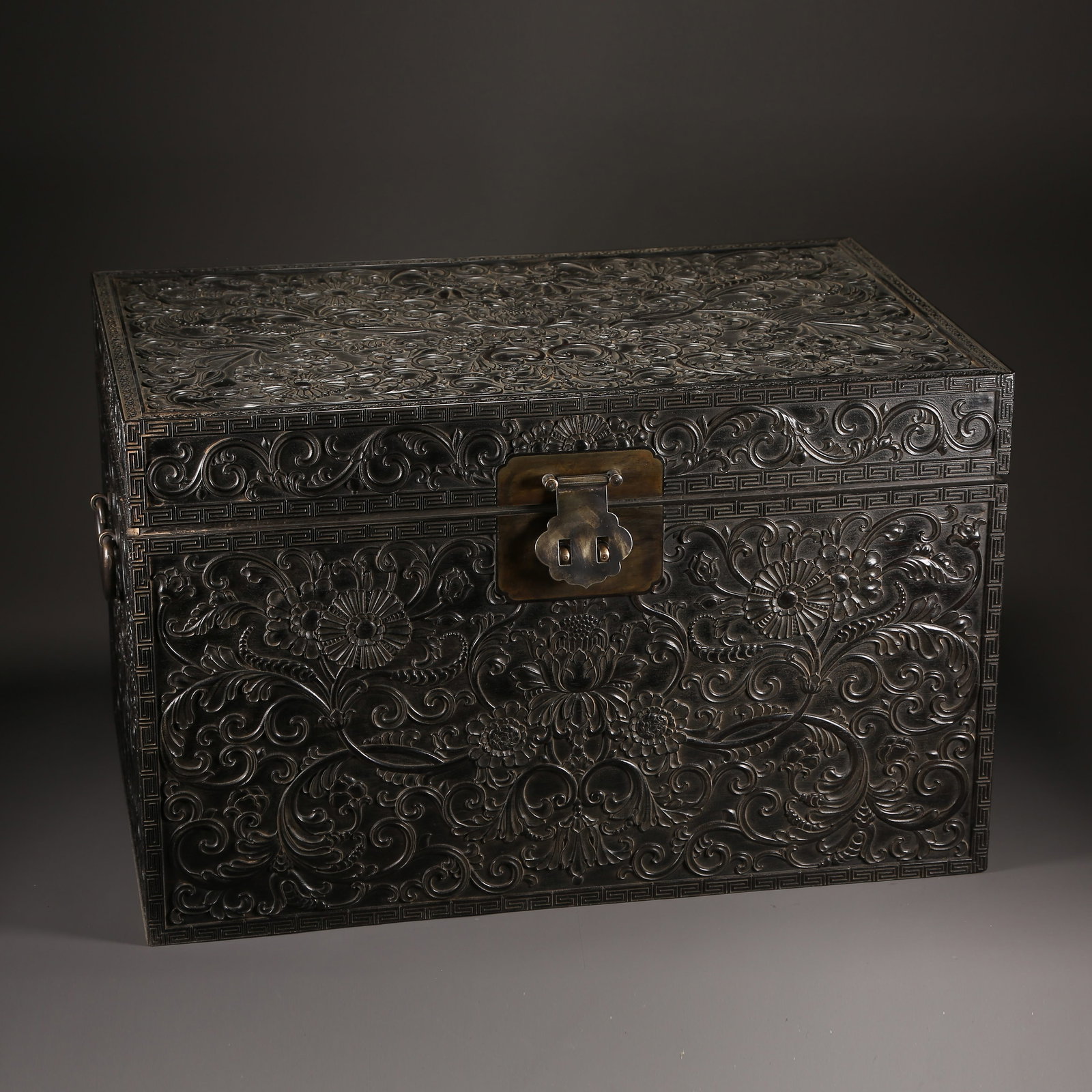 A ZITAN SQUARE BOX WITH SCROLLING-FLORAL DESIGN: Zitan square box with scrolling-floral design