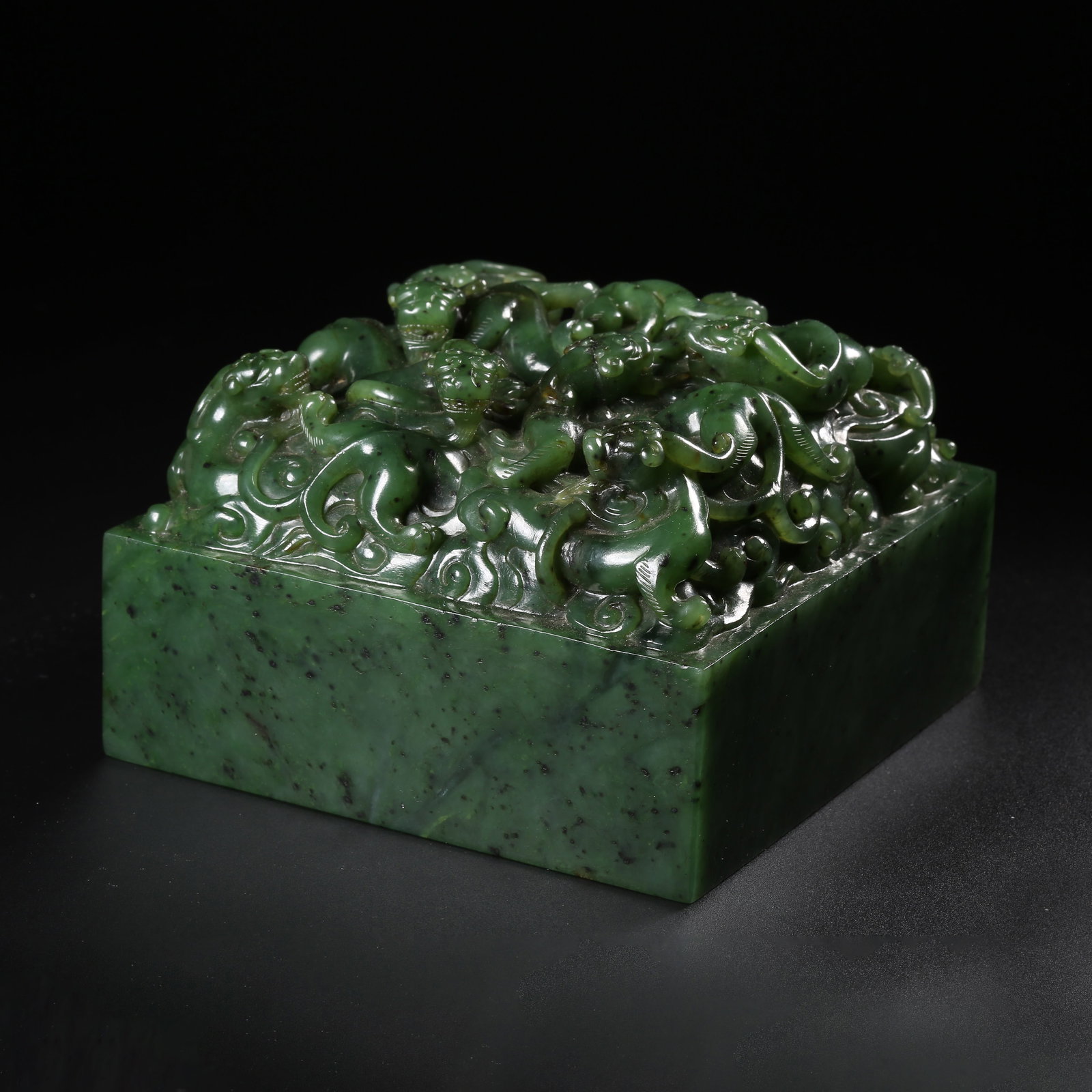 A HETIAN GREEN JADE SEAL WITH NINE-DRAGON KNOB (1 of 8)