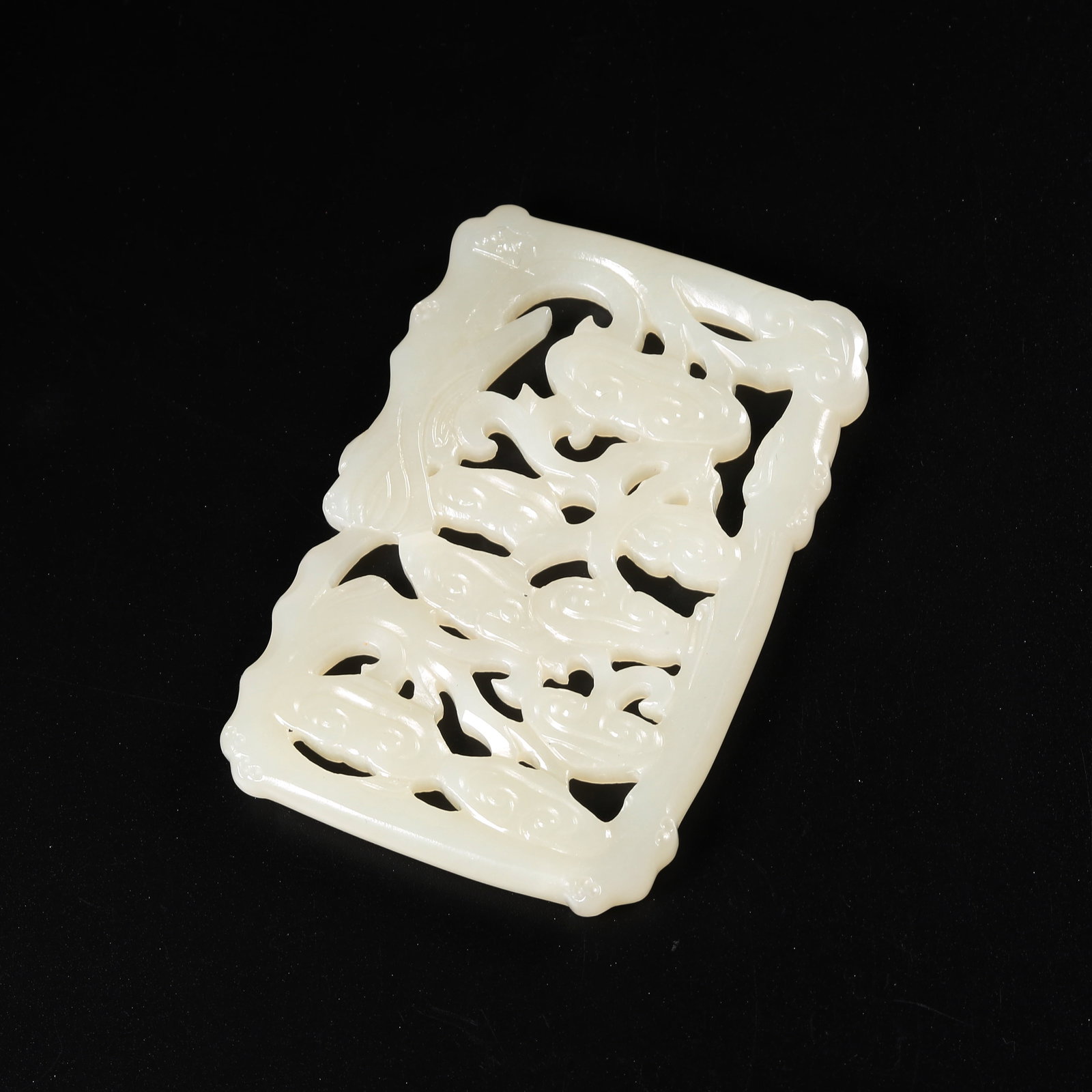 A HETIAN WHITE JADE "NINE-NINE RUYI LINGZHI" PENDANT (1 of 8)
