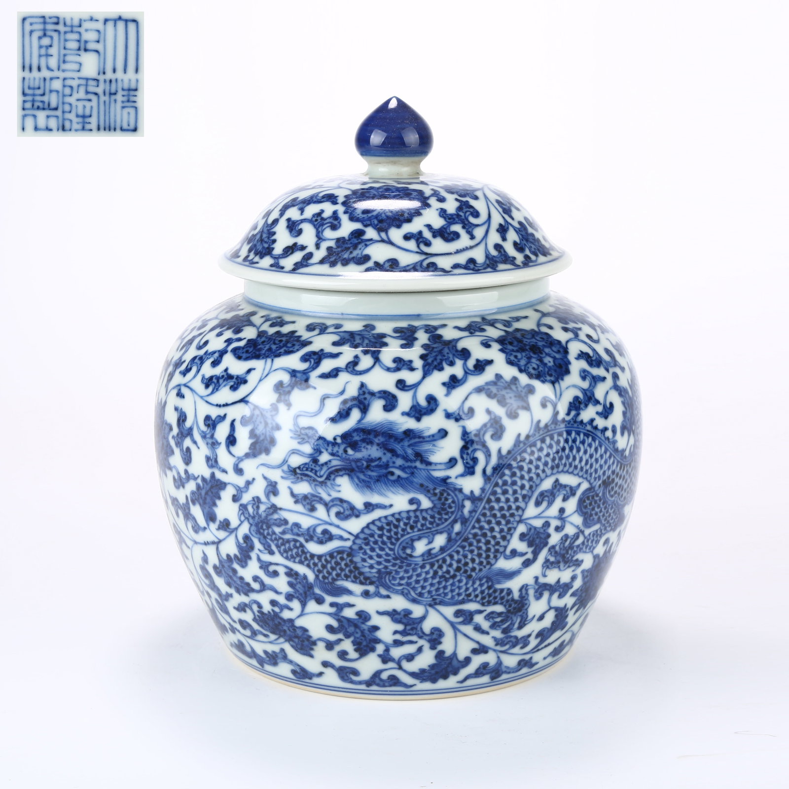 A BLUE AND WHITE COVERED JAR WITH DRAGON AMID FLOWERS DESIGN (1 of 10)