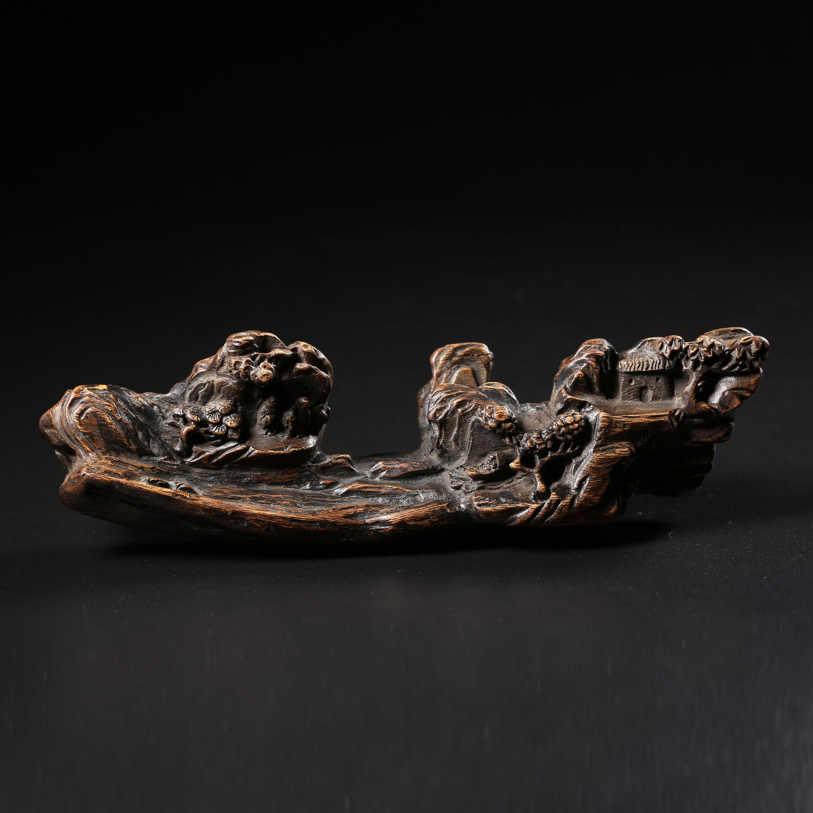 A NANMU LANDSCAPE-PATTERNED DESK ORNAMENT: Nanmu landscape-patterned desk ornament