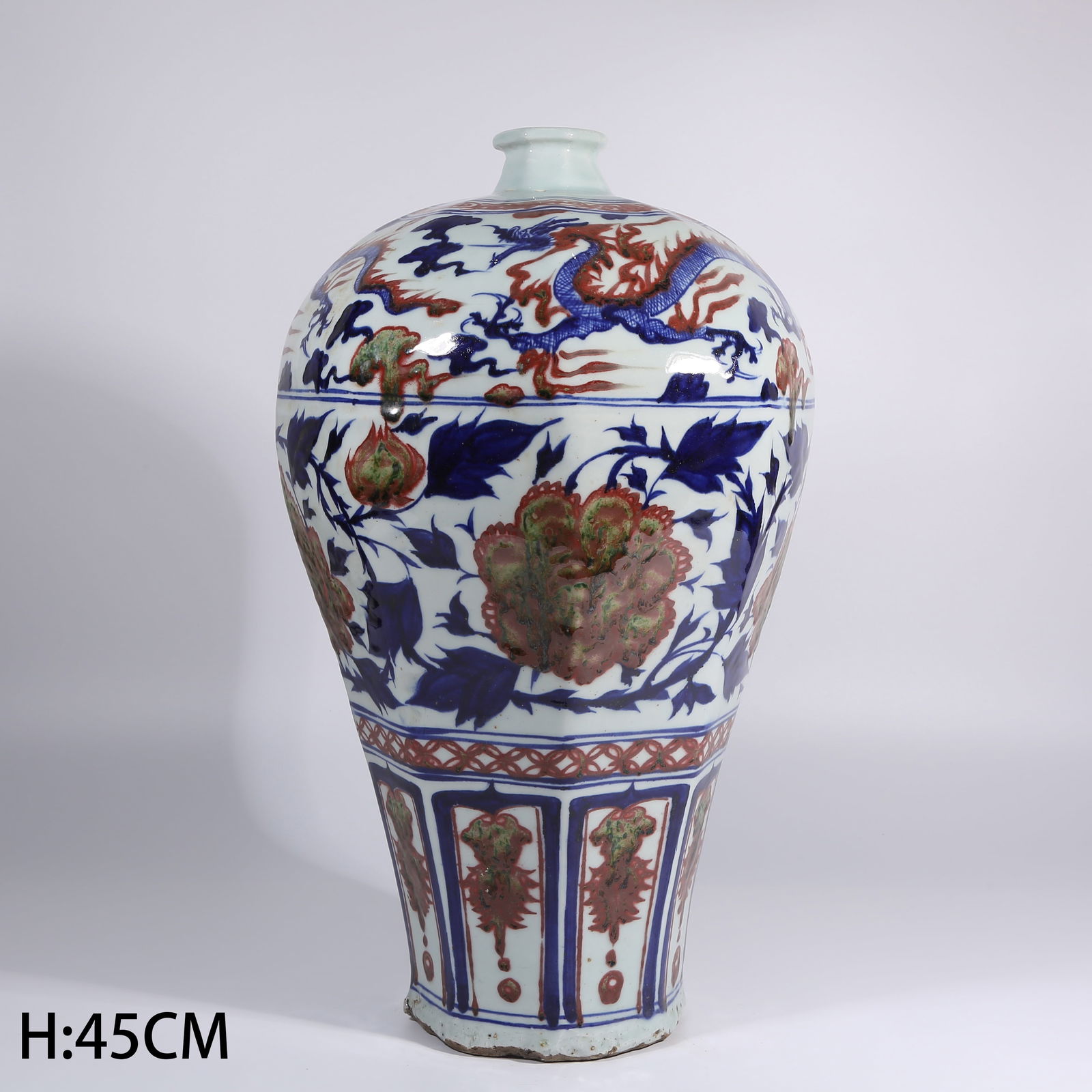 A BLUE AND WHITE UNDERGLAZE RED MEIPING VASE WITH INTERTWINED FLORAL AND DRAGON MOTIF: Blue and White Underglaze Red Meiping Vase with Intertwined Floral and Dragon Motif
