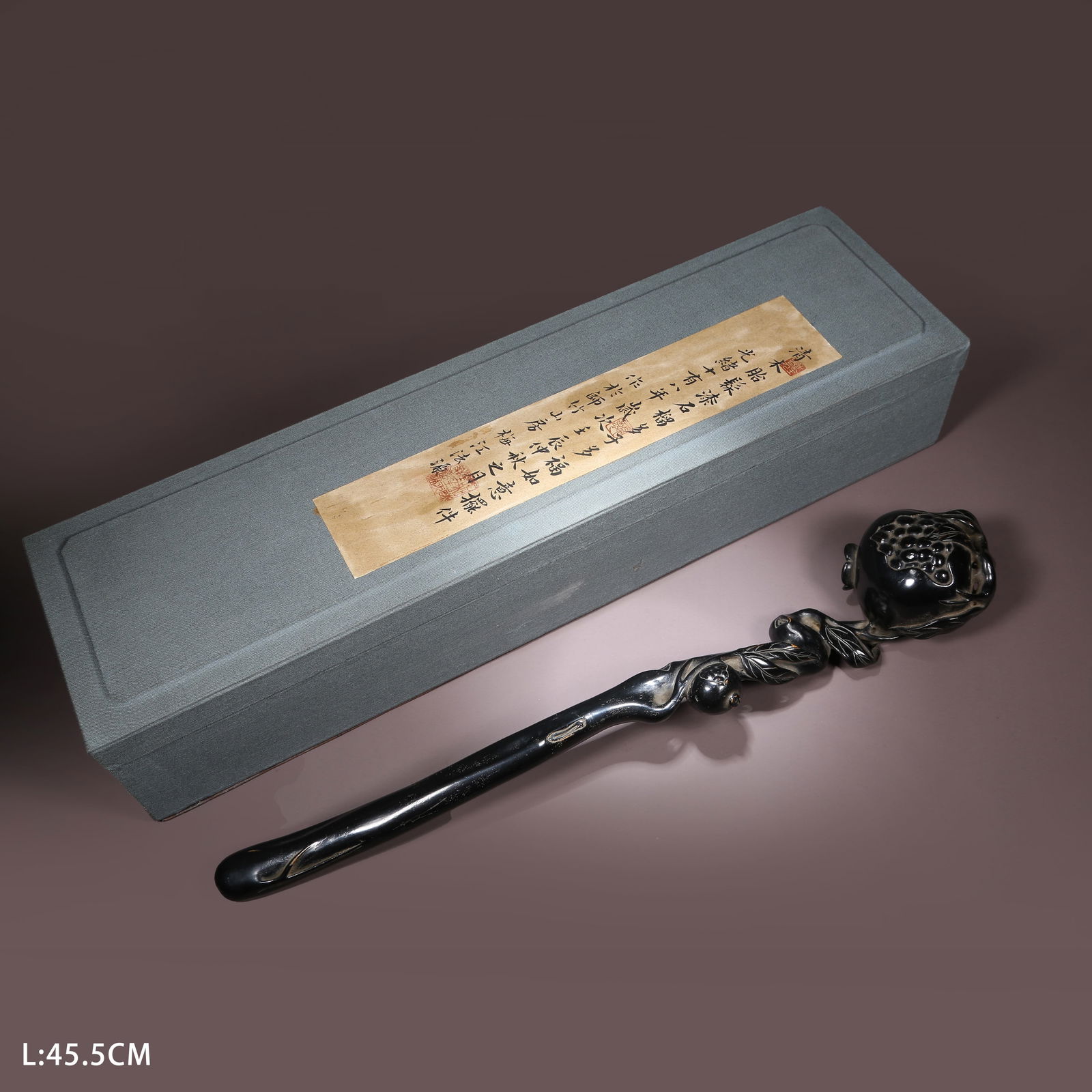 A ZITAN RUYI SCEPTER WITH POMEGRANATE DESIGN: Zitan Ruyi Scepter with Pomegranate Design