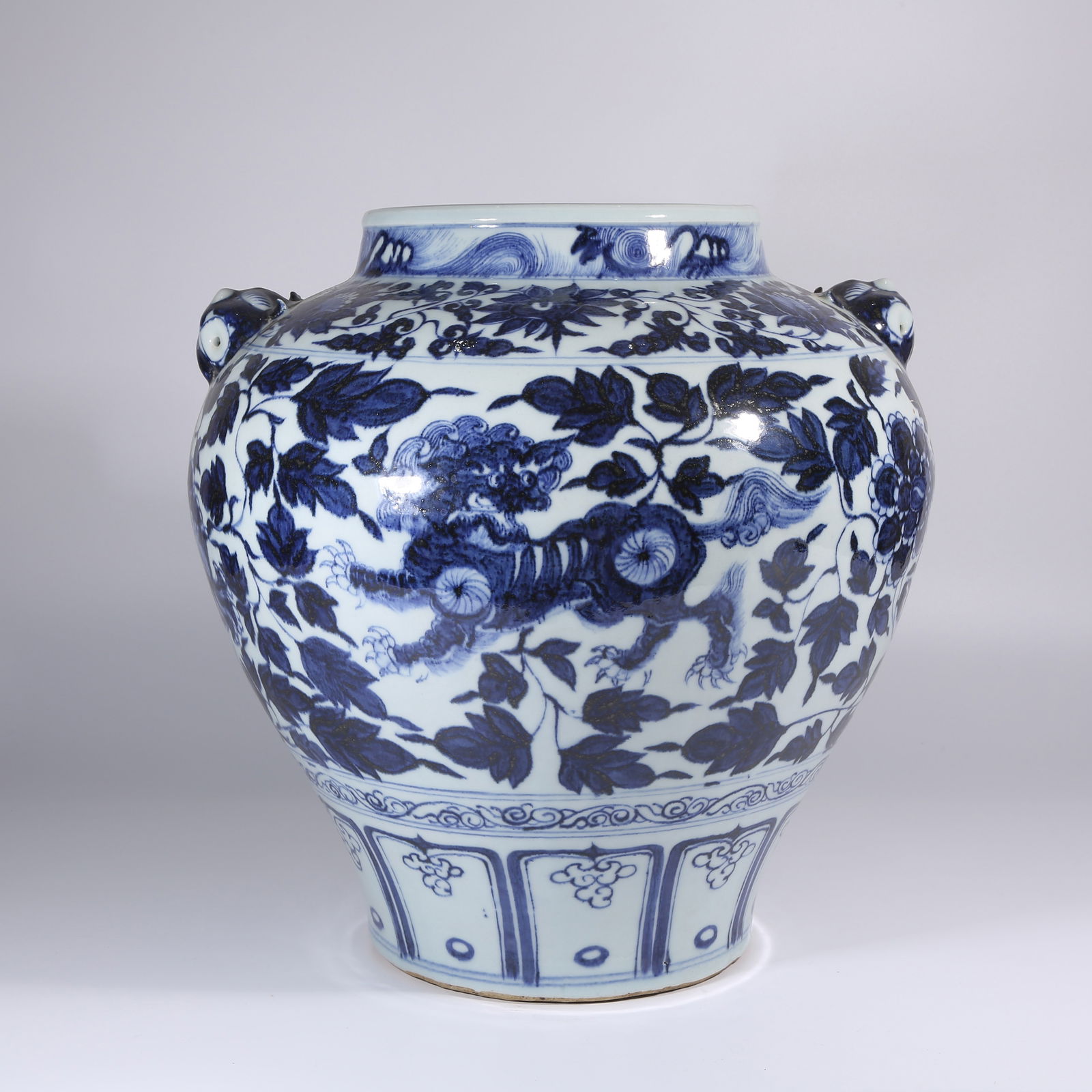 A BLUE AND WHITE JAR WITH INTERTWINED AUSPICIOUS BEASTS MOTIF (1 of 11)