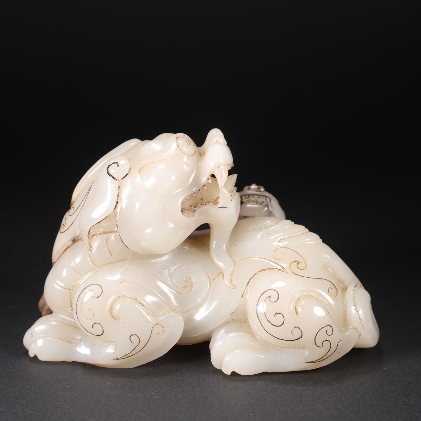 A HETIAN JADE MOTHER-AND-CHILD BEASTS WITH GOLD AND SILVER INLAY (1 of 9)