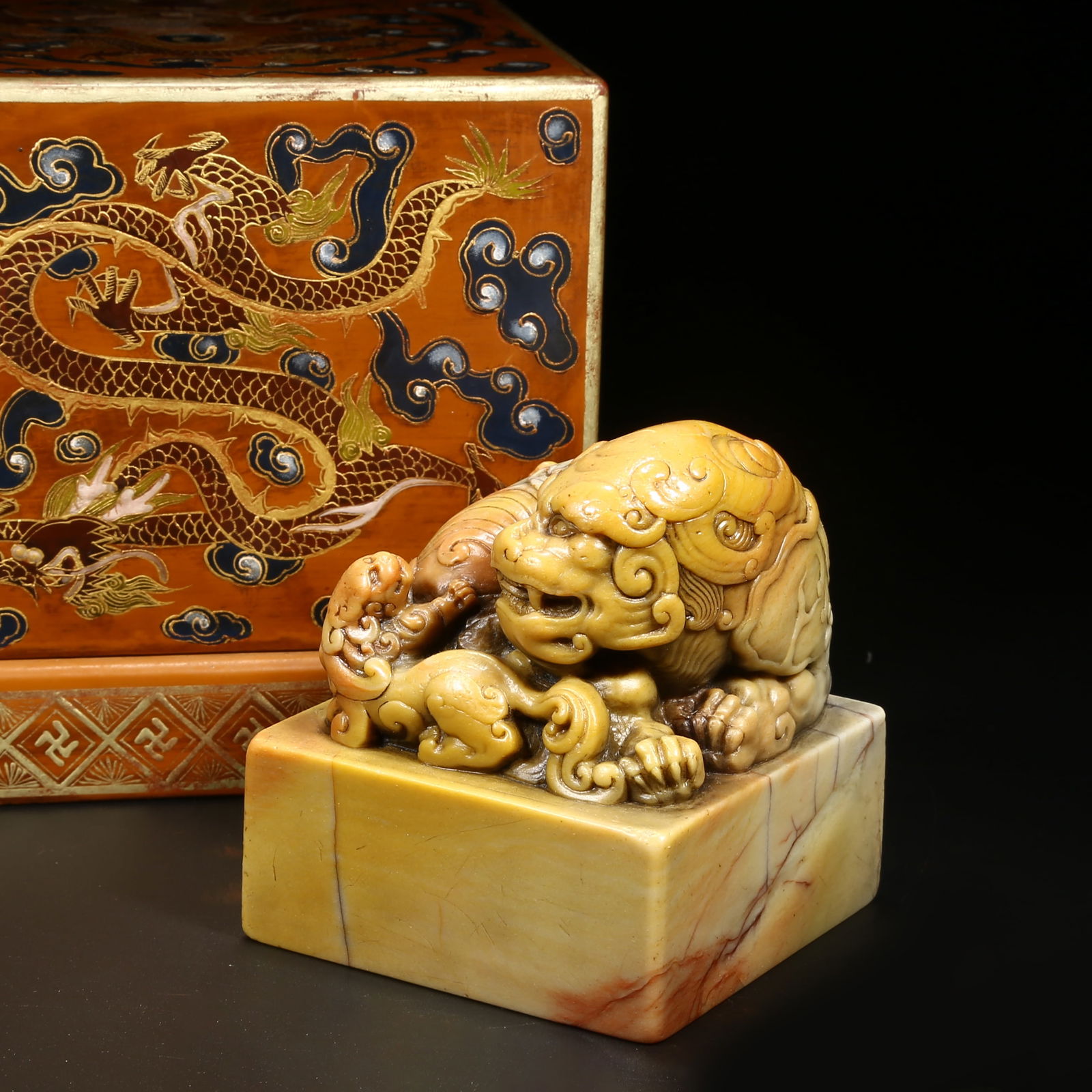 A SHOUSHAN STONE SEAL WITH BEAST KNOB WITH LACQUER BOX: Shoushan stone seal with beast knob with lacquer box