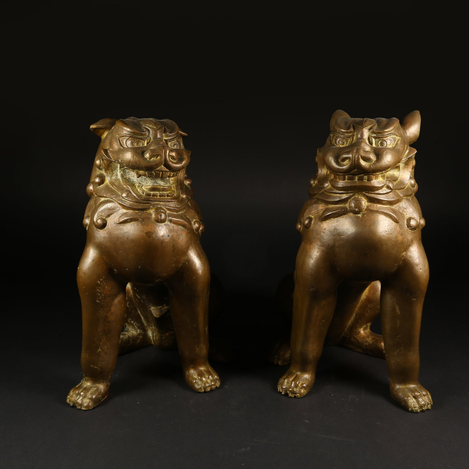 A SET OF BRONZE SEATED LION FIGURINES (1 of 9)