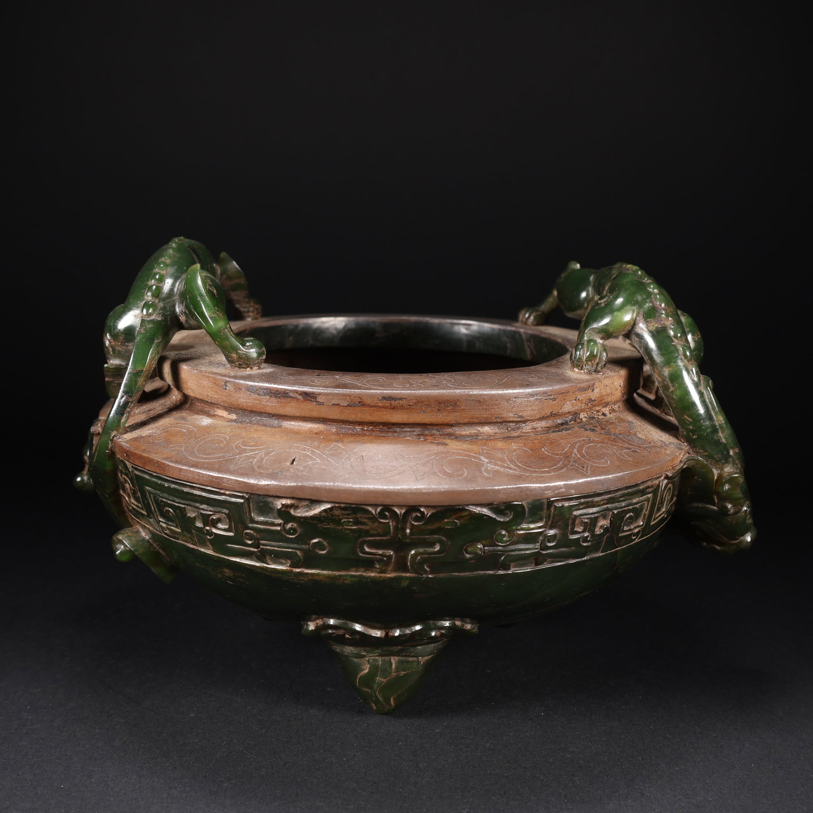 A HETIAN GREEN JADE SILVER-INLAID CHI-DRAGON DOUBLE-HANDLED THREE-LEGGED CENSER (1 of 9)