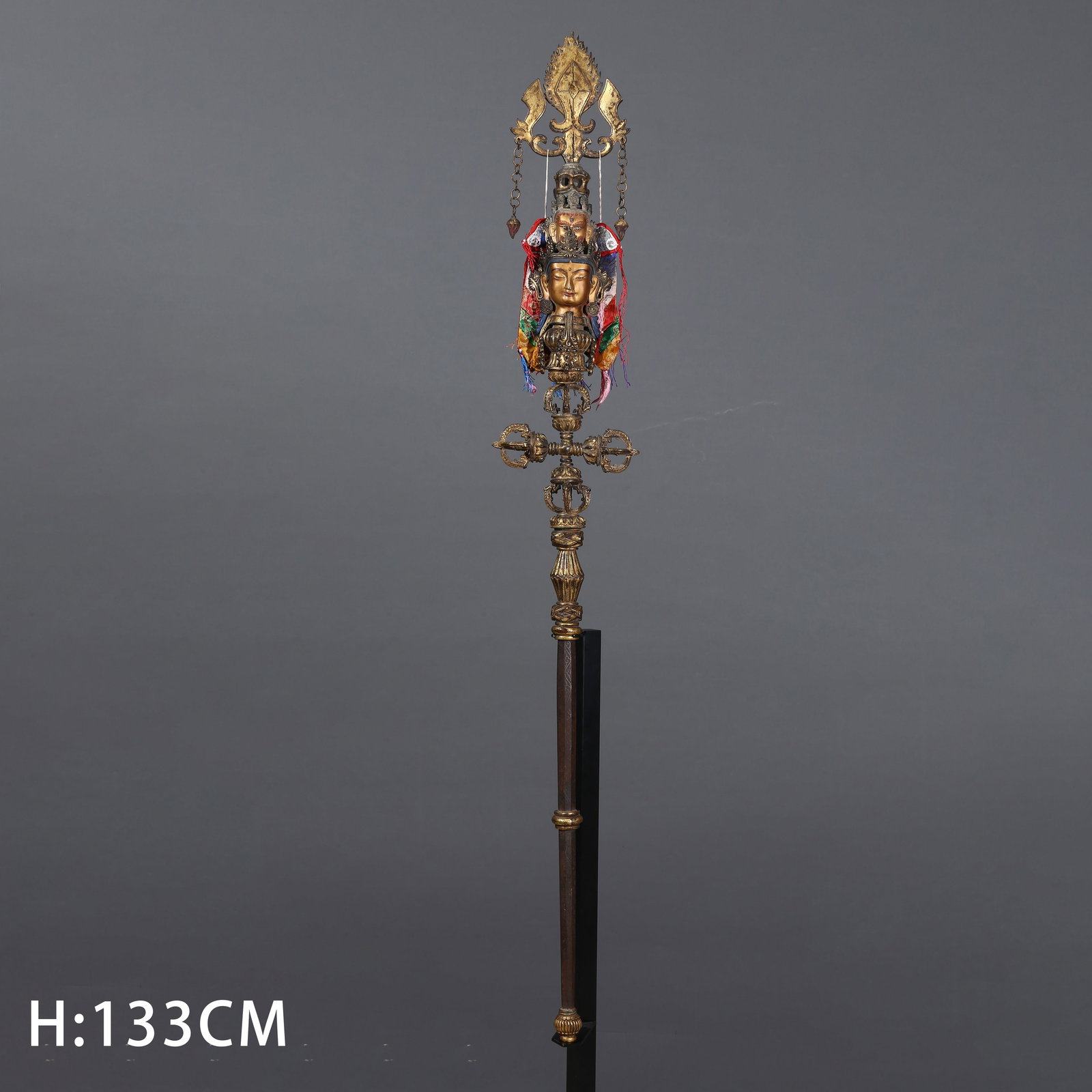 A GILDED BRONZE RITUAL STAFF (1 of 9)