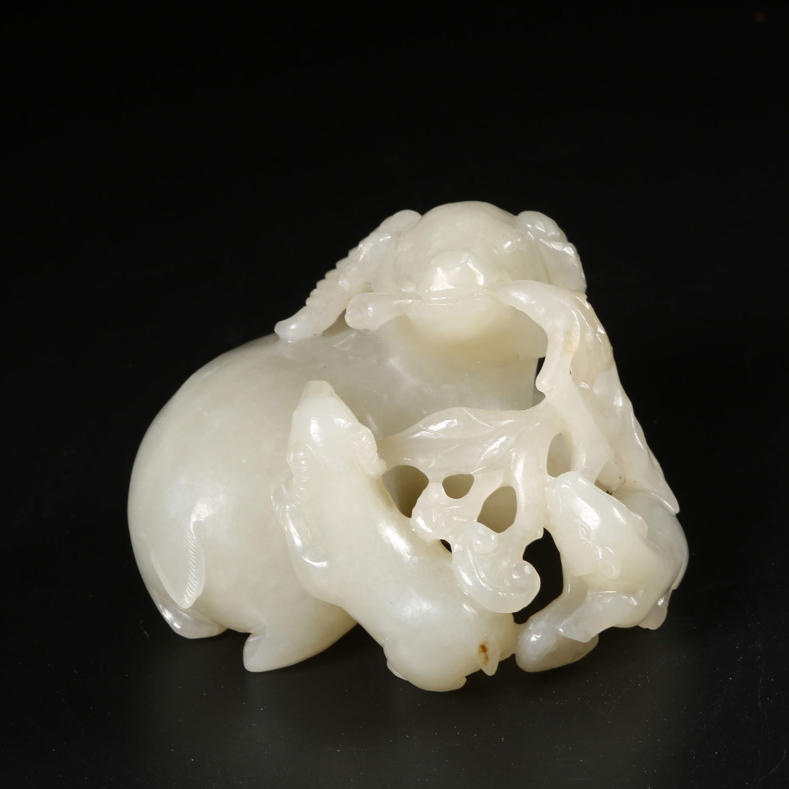 A HETIAN JADE "THREE GOATS BRING PROSPERITY" ORNAMENT (1 of 8)