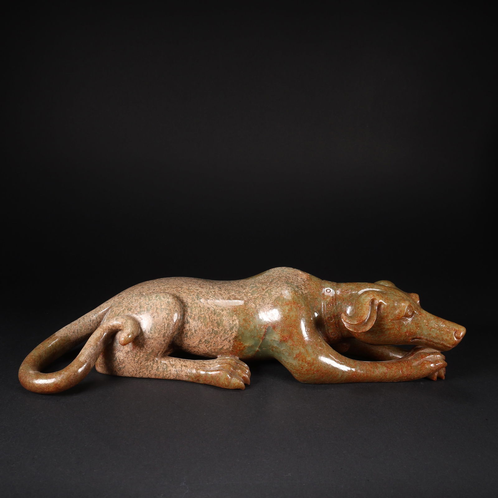A HETIAN JADE CRAWLING DOG FIGURINE (1 of 9)