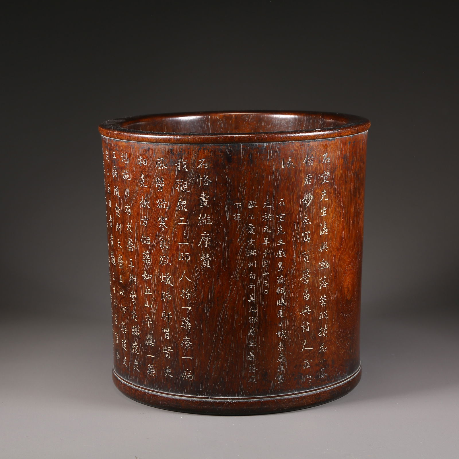 A HUANGHUALI BRUSH POT CARVED WITH POETIC INSCRIPTIONS (1 of 9)