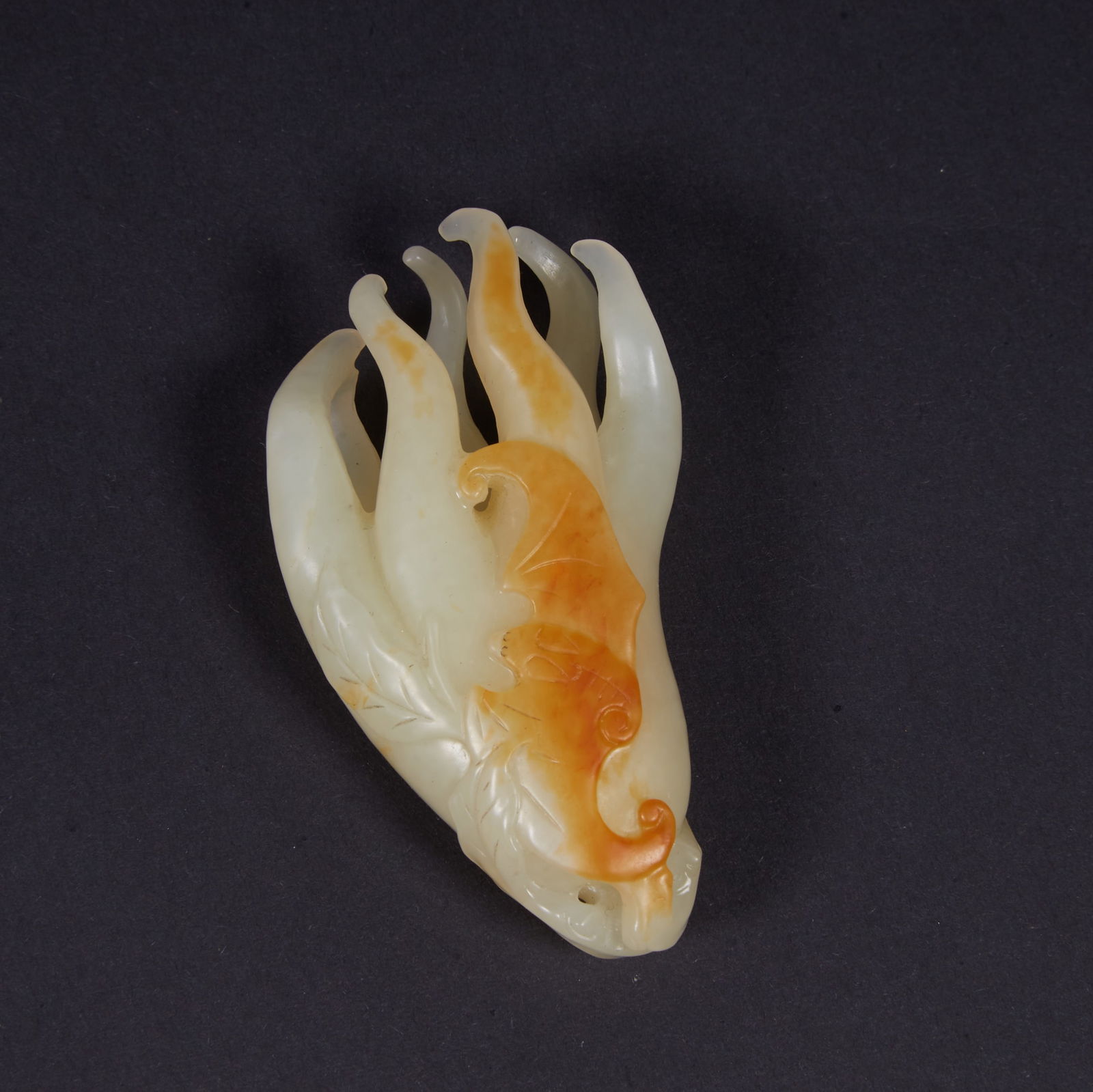 A HETIAN JADE "BUDDHA'S HAND" PENDANT (1 of 9)
