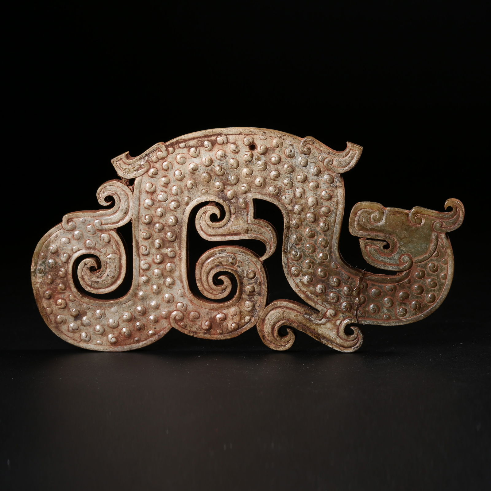 A ARCHAIC JADE S-SHAPED DRAGON PENDANT (1 of 9)