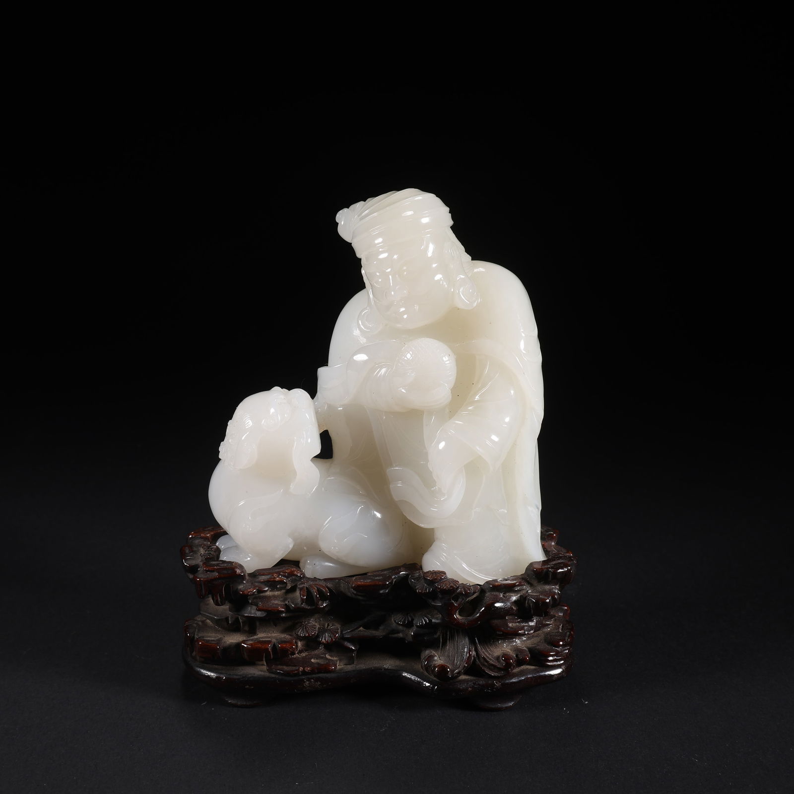A HETIAN JADE "HU PEOPLE PLAYING WITH LIONS" FIGURE (1 of 9)
