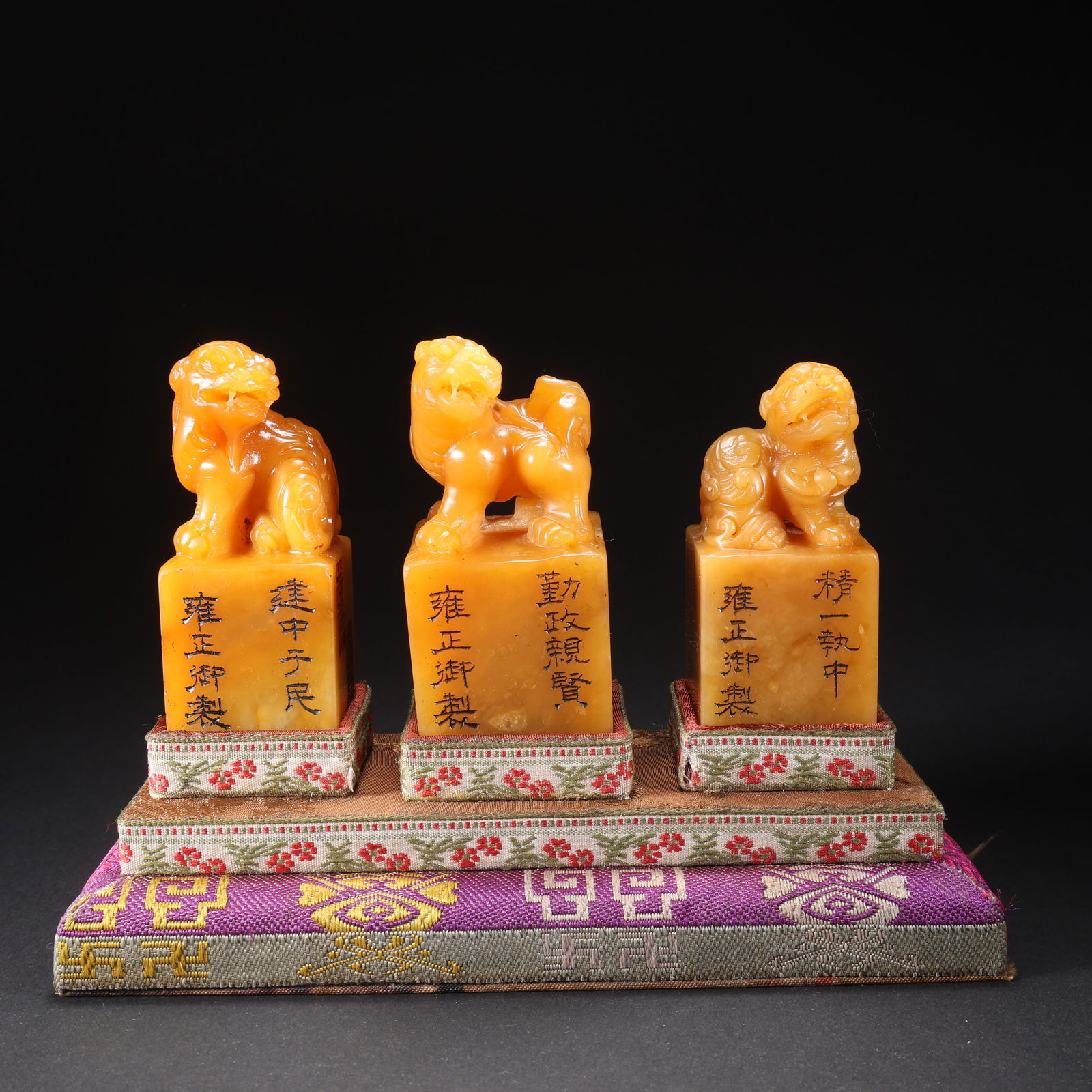 A SET OF THREE SHOUSHAN TIANHUANG STONE SEALS WITH BEAST HANDLES (1 of 9)