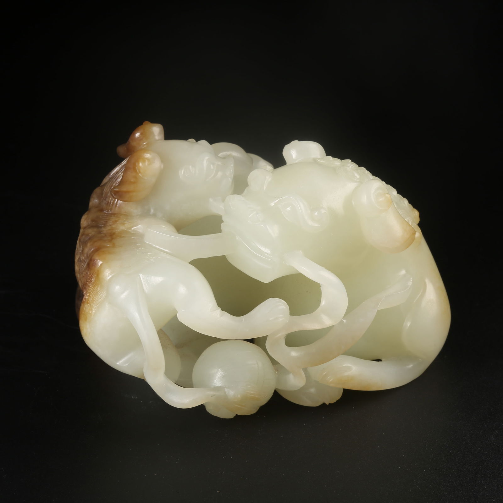 A ARCHAIC JADE PARENT-AND-OFFSPRING BEAST ORNAMENT (1 of 8)
