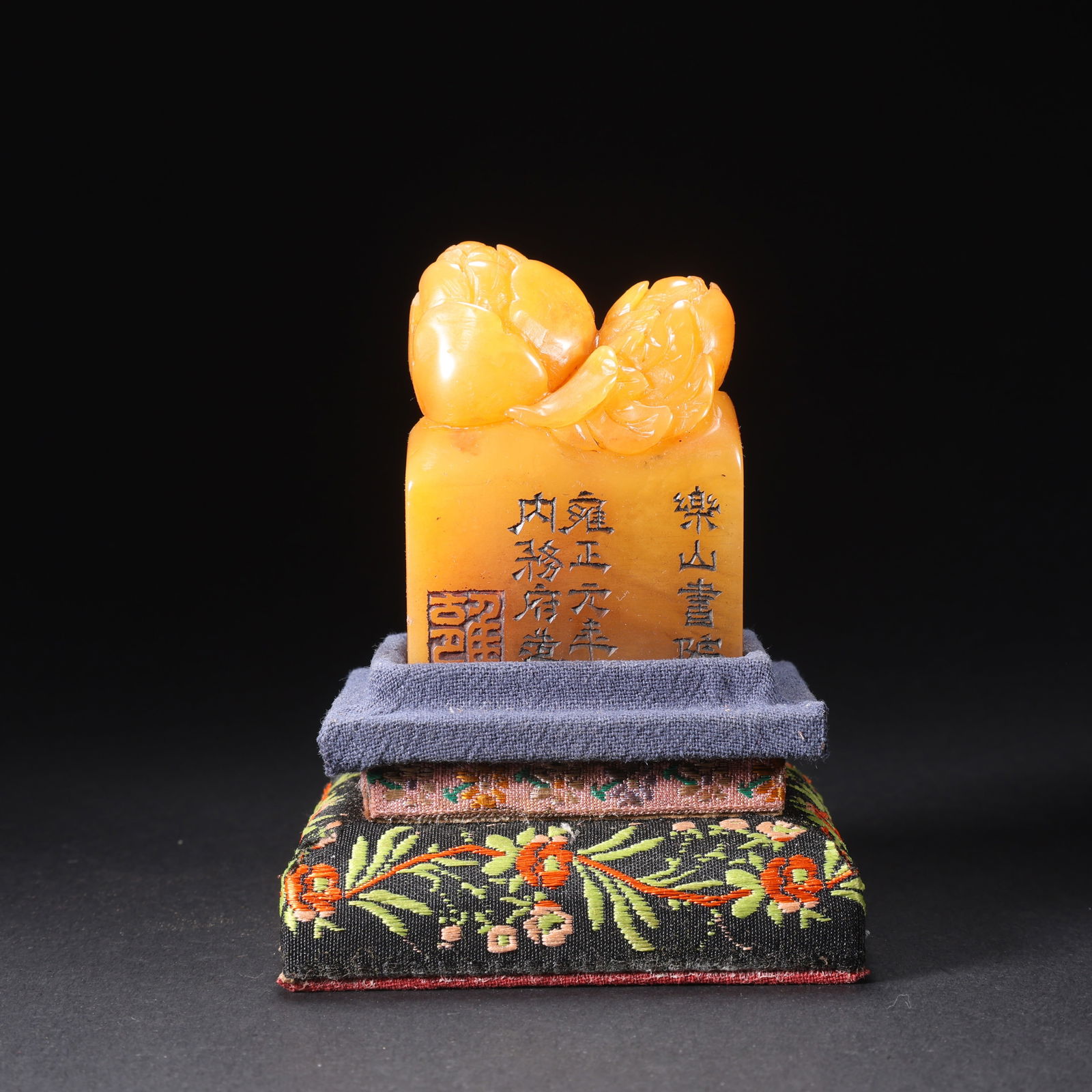 A SHOUSHAN TIANHUANG STONE PEONY-HANDLE SEAL: Shoushan Tianhuang Stone Peony-Handle Seal