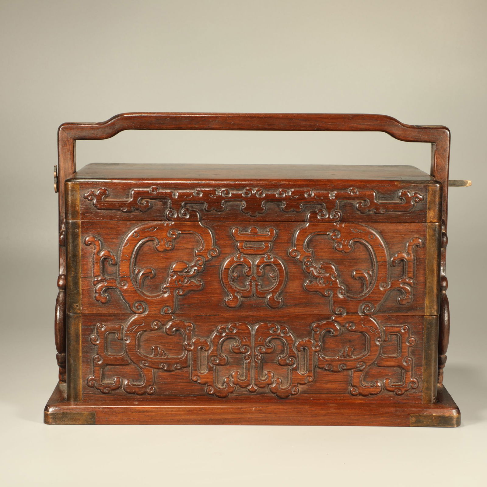A HUANGHUALI WOOD HANDLED BOX CARVED WITH DRAGON MOTIFS (1 of 6)