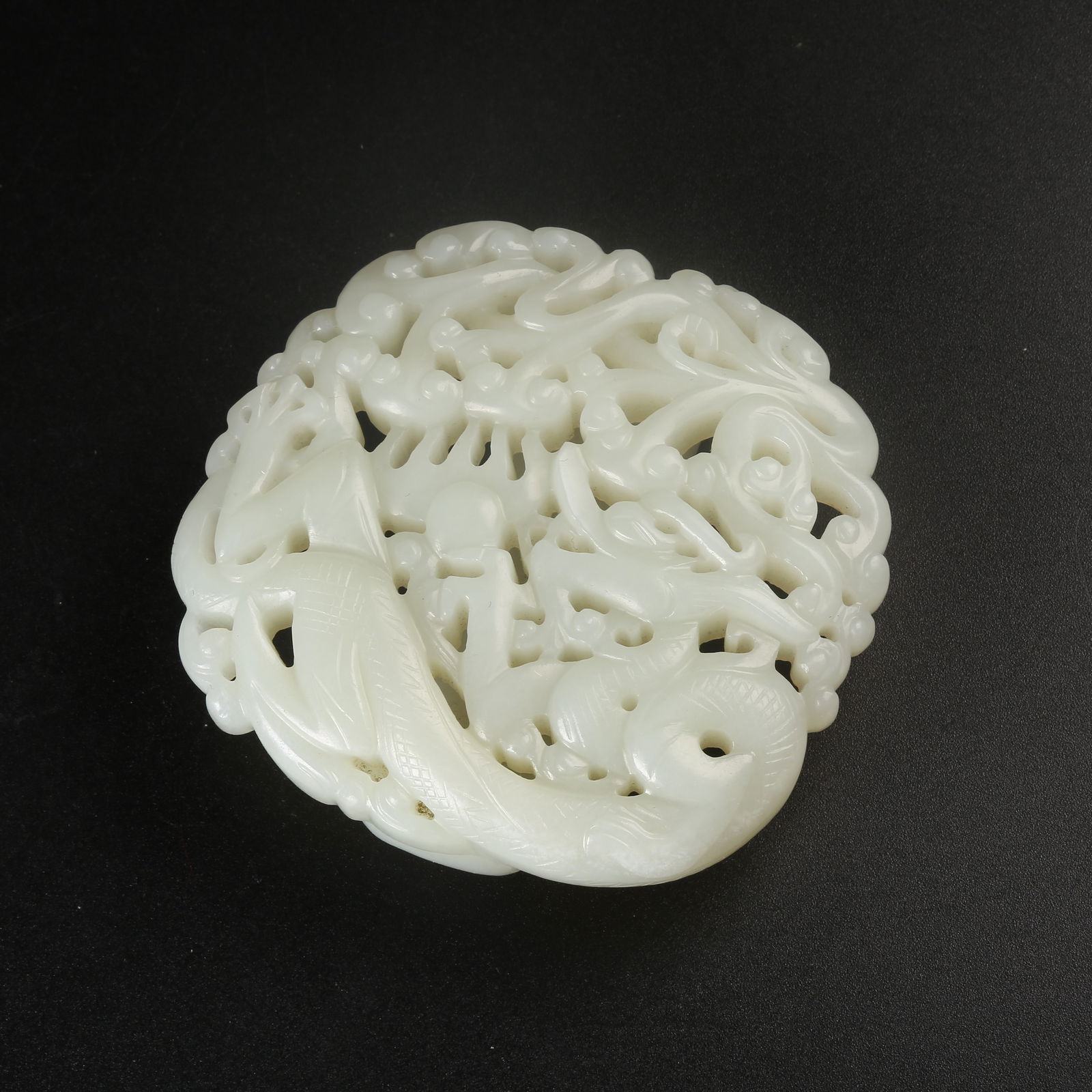 A HETIAN WHITE JADE DRAGON MOTIF BELT ORNAMENT (1 of 9)