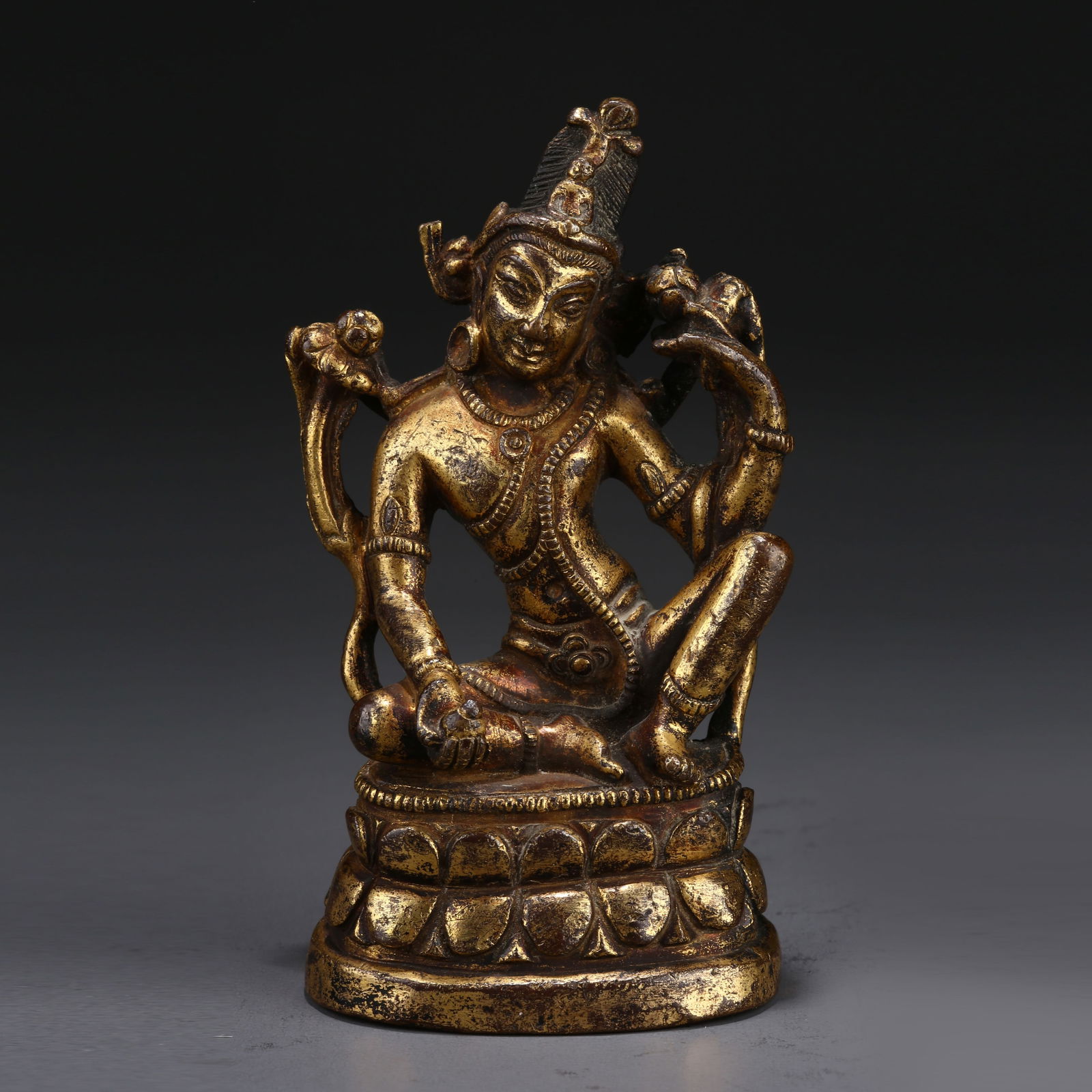 A GILT BRONZE PORTABLE STATUE OF CONTEMPLATIVE AVALOKITESHVARA: Gilt Bronze Portable Statue of Contemplative Avalokiteshvara